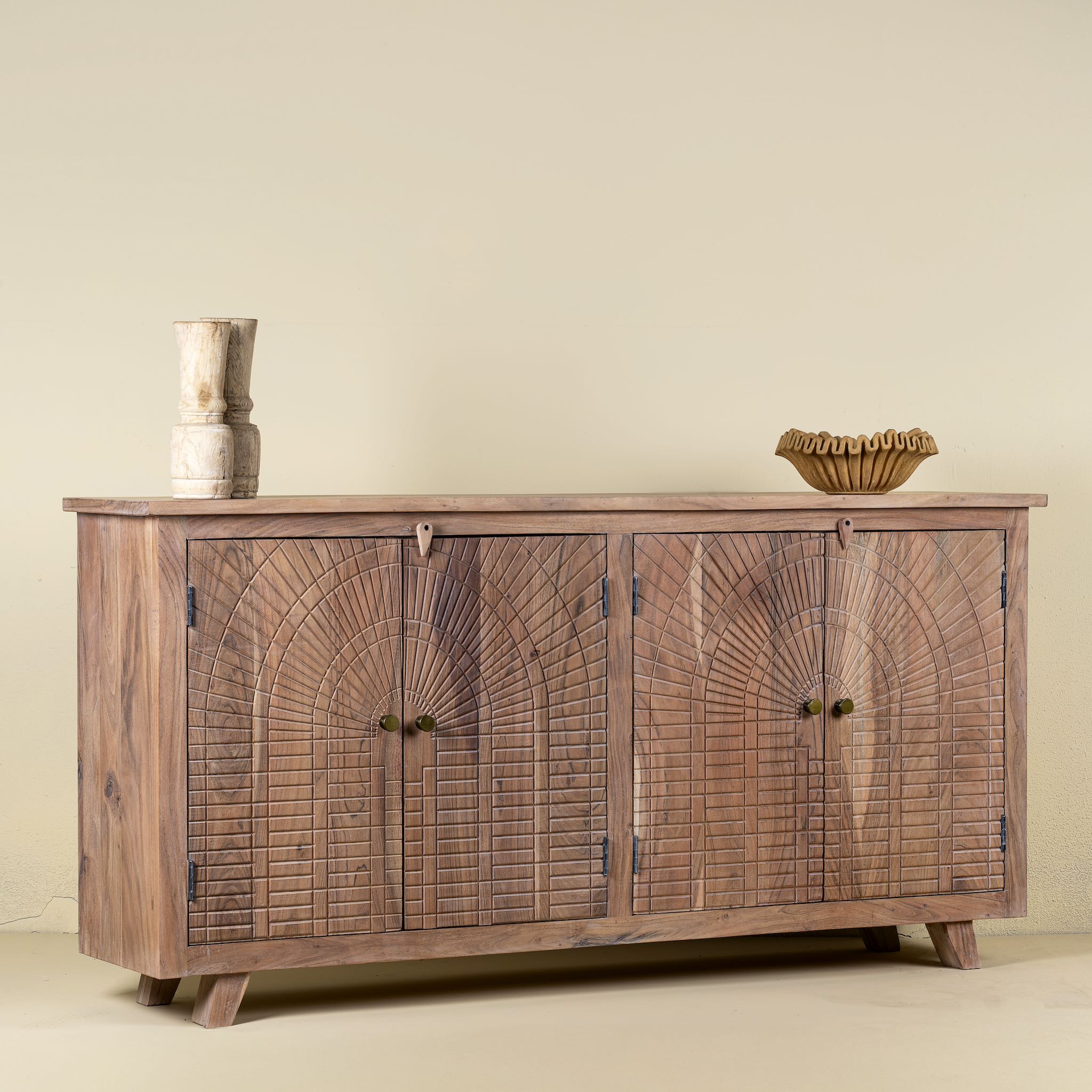 Side angle image of a acacia wood cabinet with hand-carved geometric patterns, artisan carved wood furniture for living room storage, 180 × 40 × 90 cm.