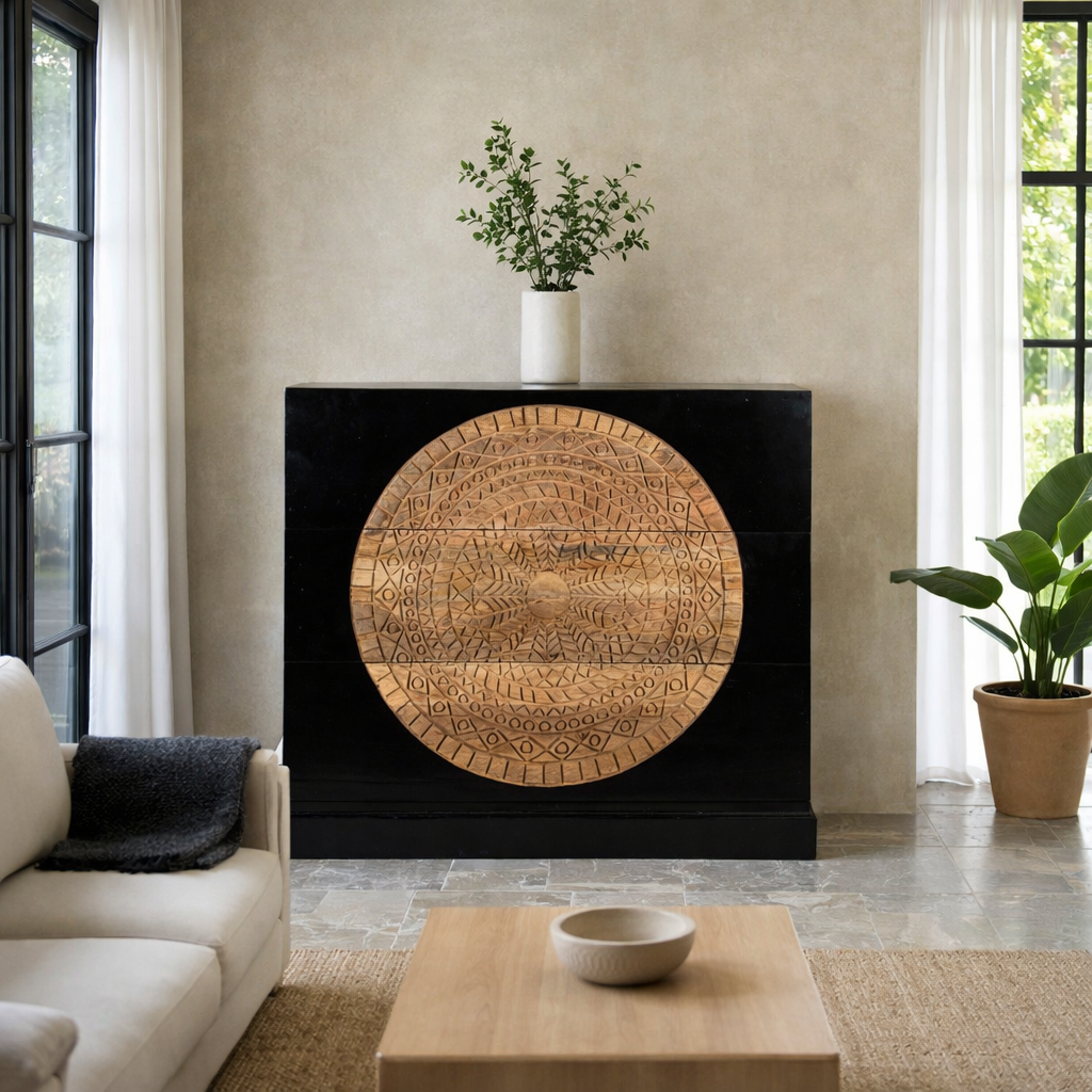 Lifestyle imagination of a mandala carved wood chest with black frame and natural carved mango wood drawers, mango wood drawer chest for modern bohemian interiors, 120 × 47 × 110 cm.
