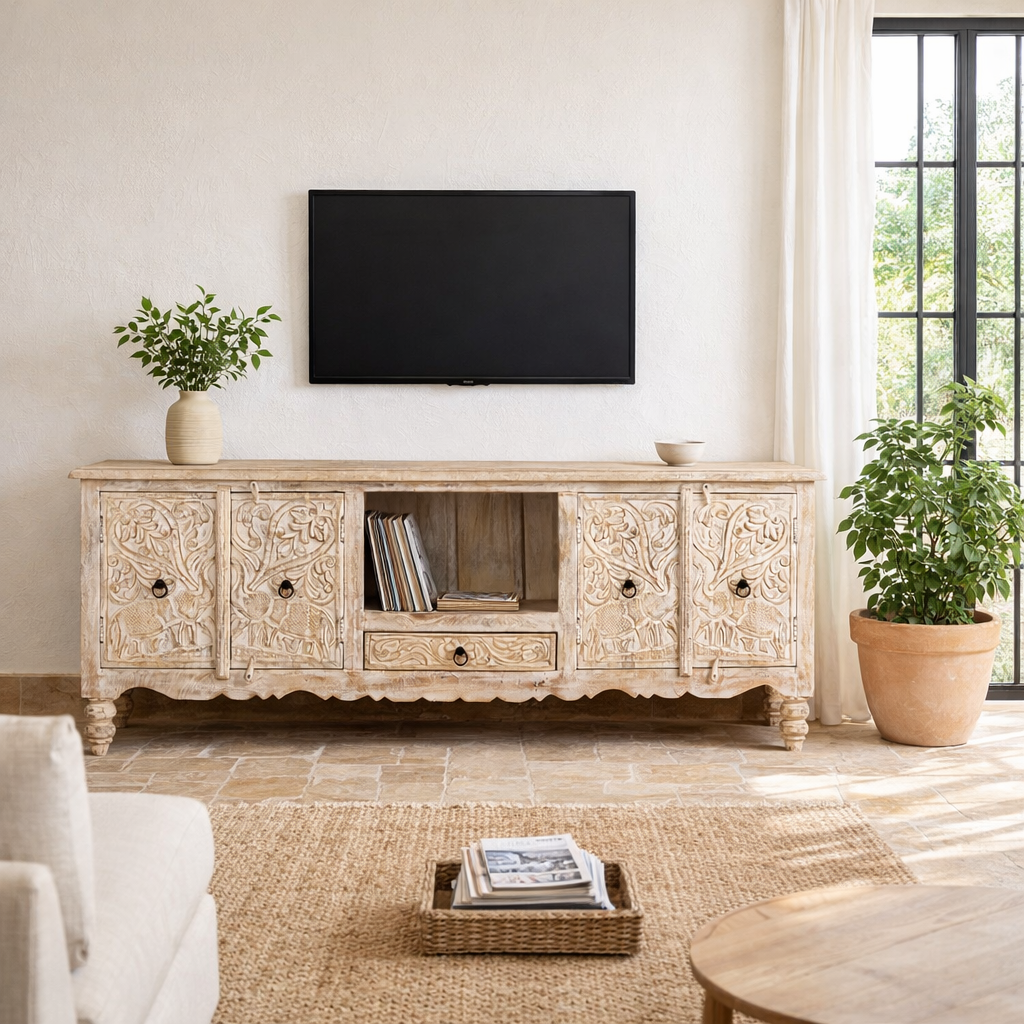 Lifestyle image of a hand-carved traditional sideboard made from mango wood with whitewashed floral detailing; perfect as entryway table vintage or TV unit, 198 × 82 × 40 cm.