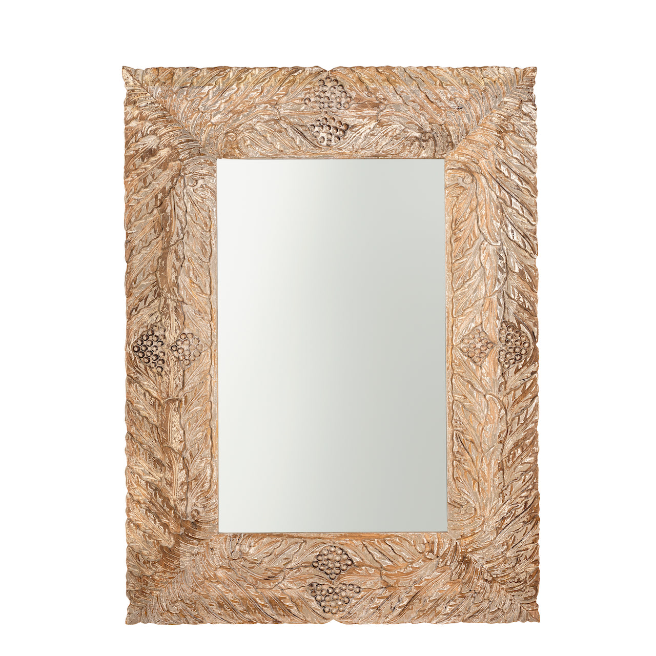 White background image of a carved mango wood mirror Anumati with floral motifs and distressed finish. A handcrafted Indian furniture piece perfect for vintage home decor and artisanal interiors.
