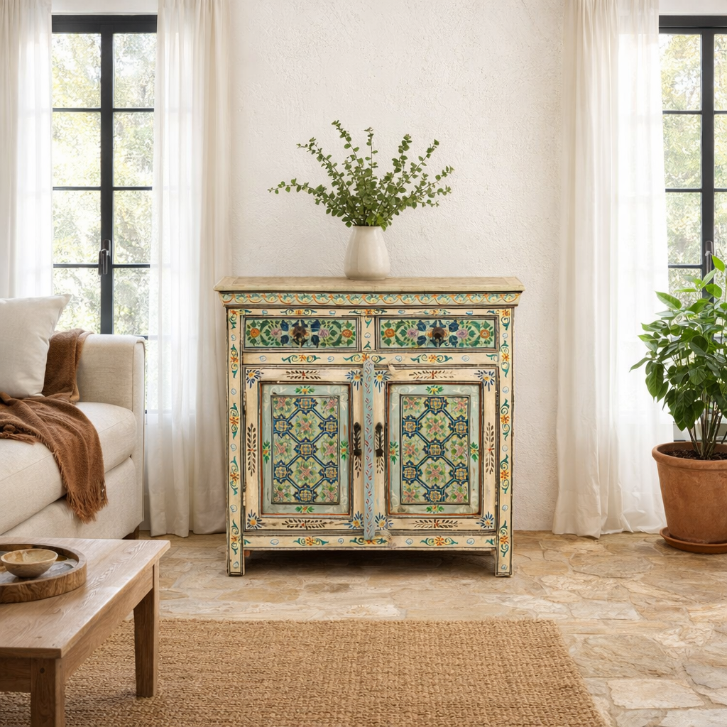 Lifestyle imagination of a and painted cabinet made from reclaimed wood with colourful traditional Indian motifs, 90 × 90 × 40 cm.