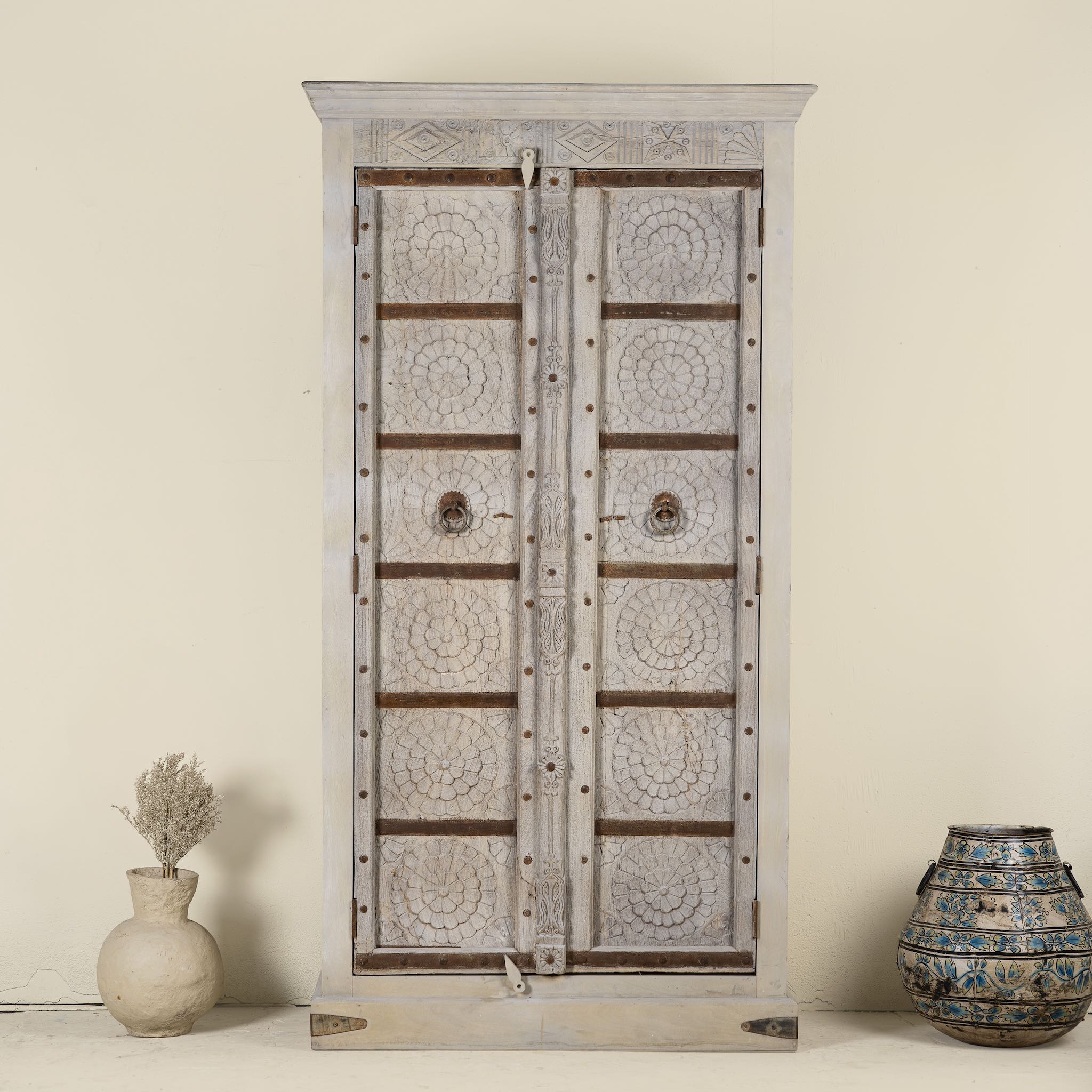 Old door cabinet with reclaimed teak doors, floral carvings, and iron accents; artisan teak wood wardrobe with mango wood frame, 100 × 44 × 206 cm.