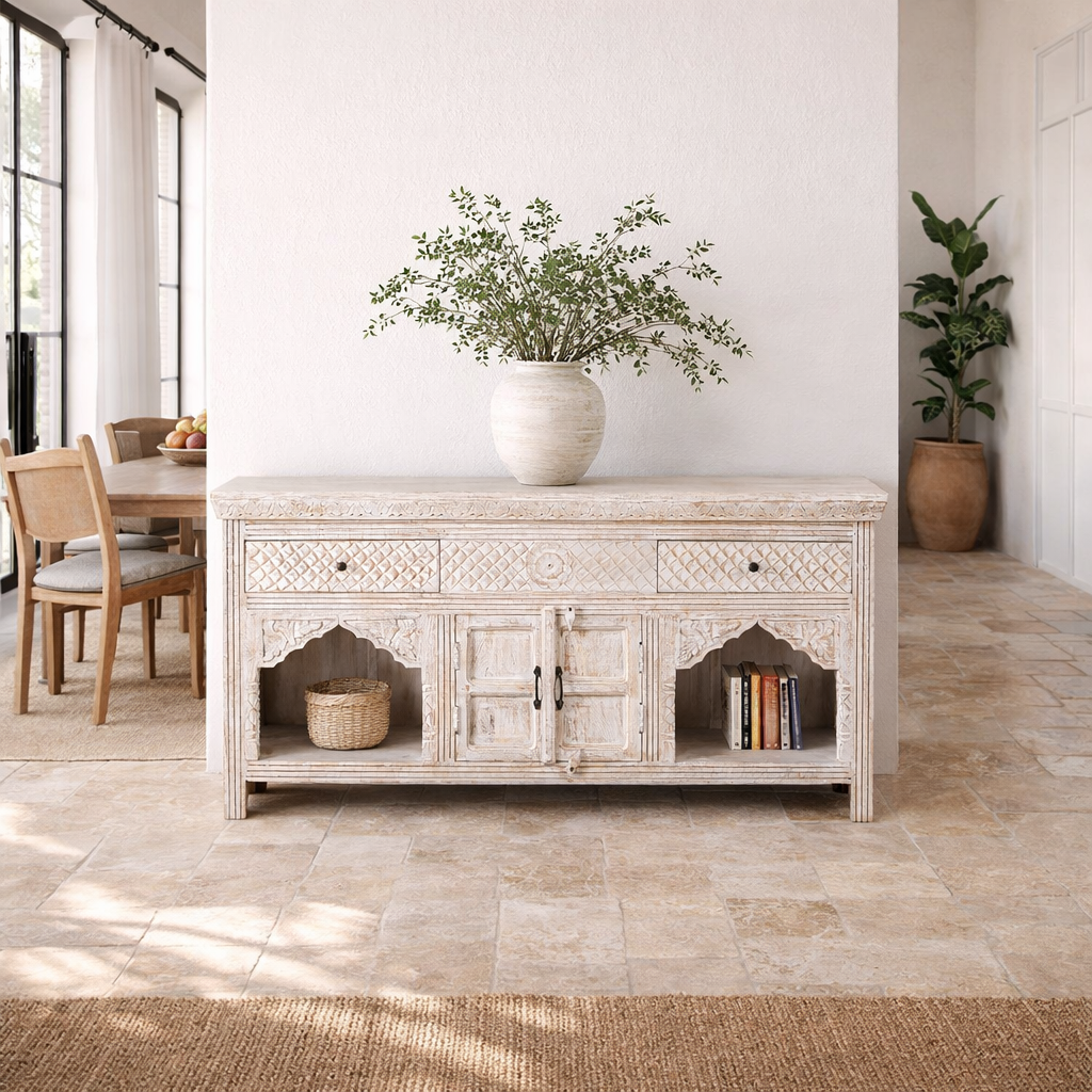 Lifestyle image of a handcrafted wooden carved sideboard with oriental arches and whitewashed finish; perfect as an entryway table vintage feature, 160 × 80 × 40 cm.