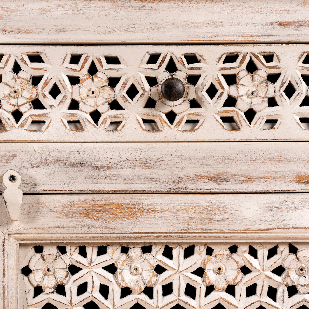 Close up image of a pair of carved nightstands made from mango wood with geometric patterns and distressed finish; perfect bedroom furniture, 76 × 56 × 35 cm.