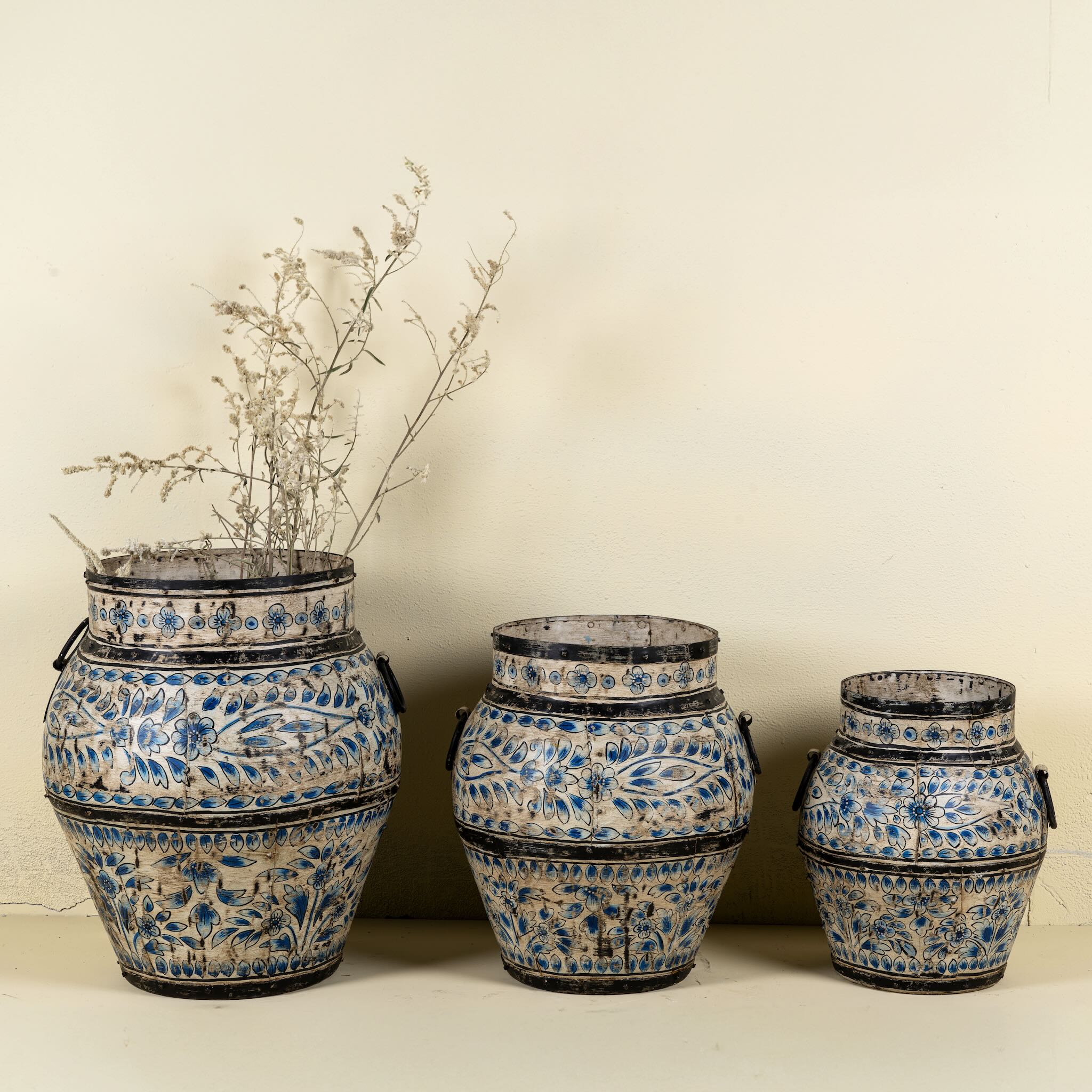 Set of 3 hand-painted decorative iron pots in cream and blue floral designs, featuring traditional Indian motifs – perfect for vintage home accessories and painted iron decoration.