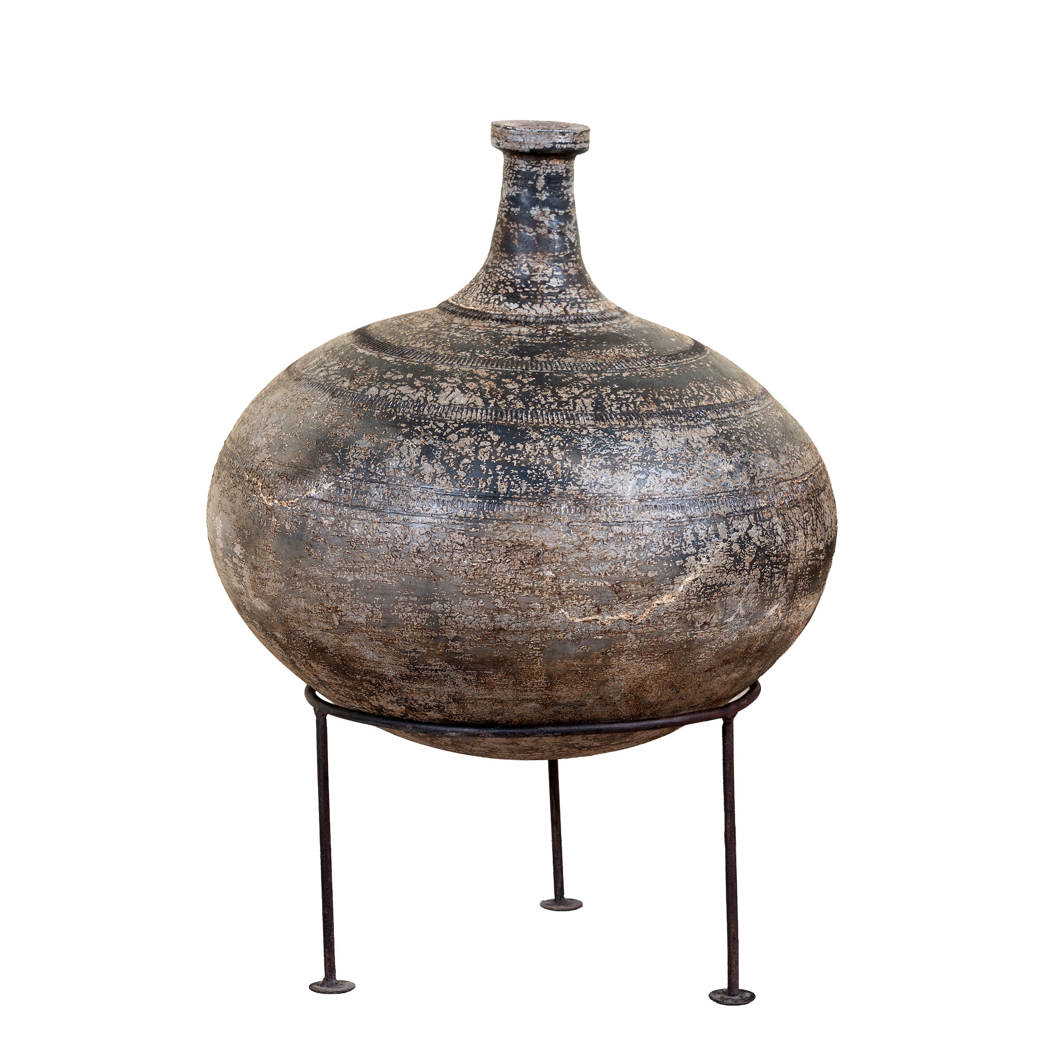 White background image of a hand-painted clay vase with rounded body, narrow neck and iron stand, handcrafted decorative vase with rustic aged finish, 40cm.