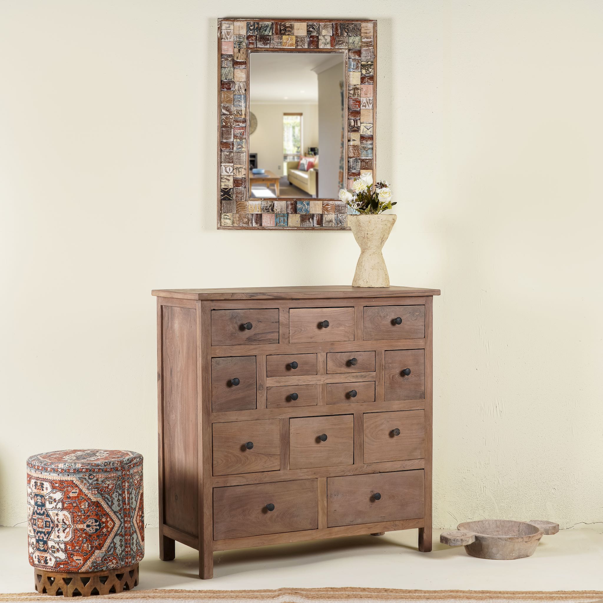 Side angle image of a teak furniture chest of drawers made from reclaimed old teak wood, eco-friendly sustainable furniture in Ibiza style, 100 × 40 × 100 cm.