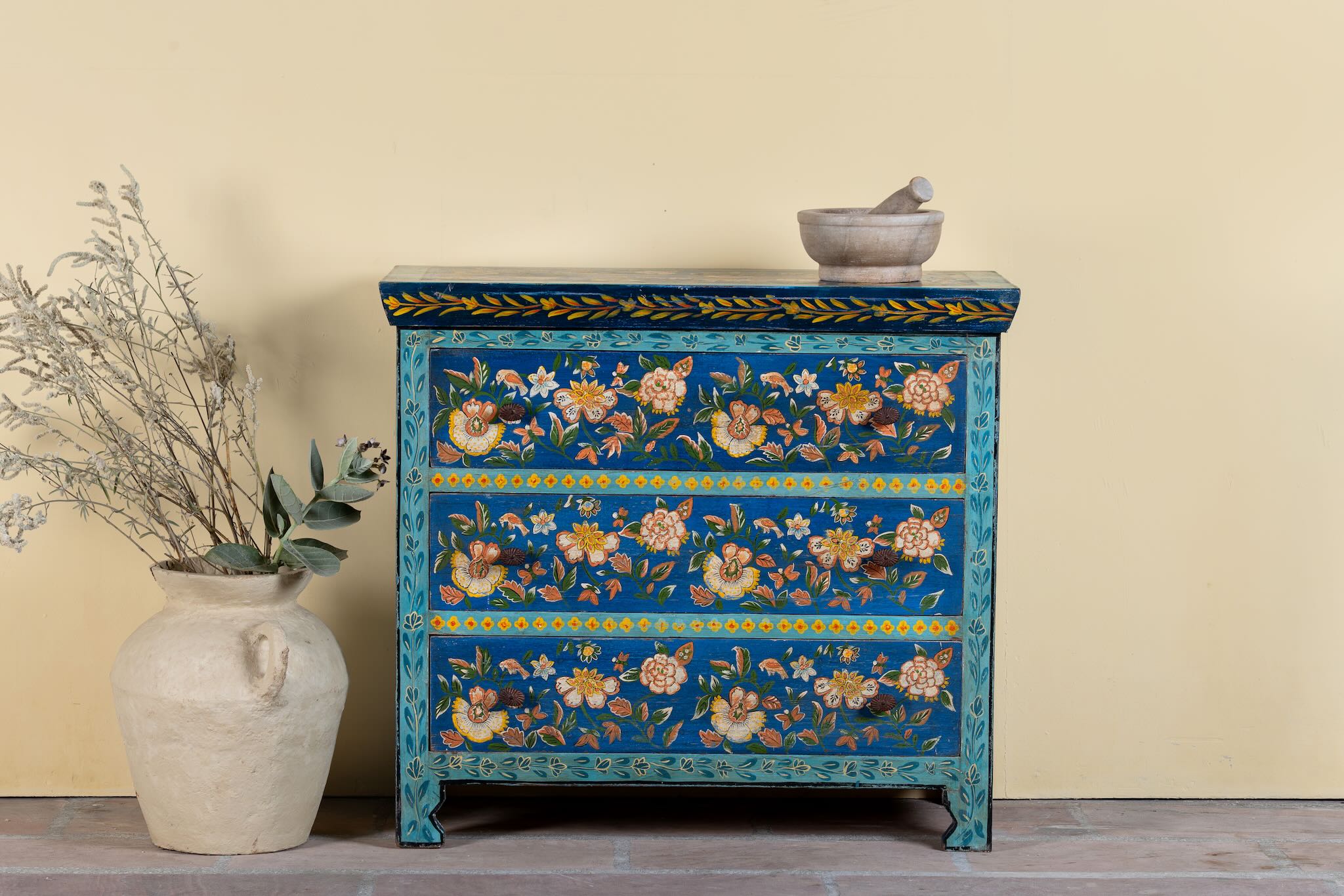Hand-painted cupboard made of reclaimed wood with floral drawer fronts – Divisha model by Om Home & Garden