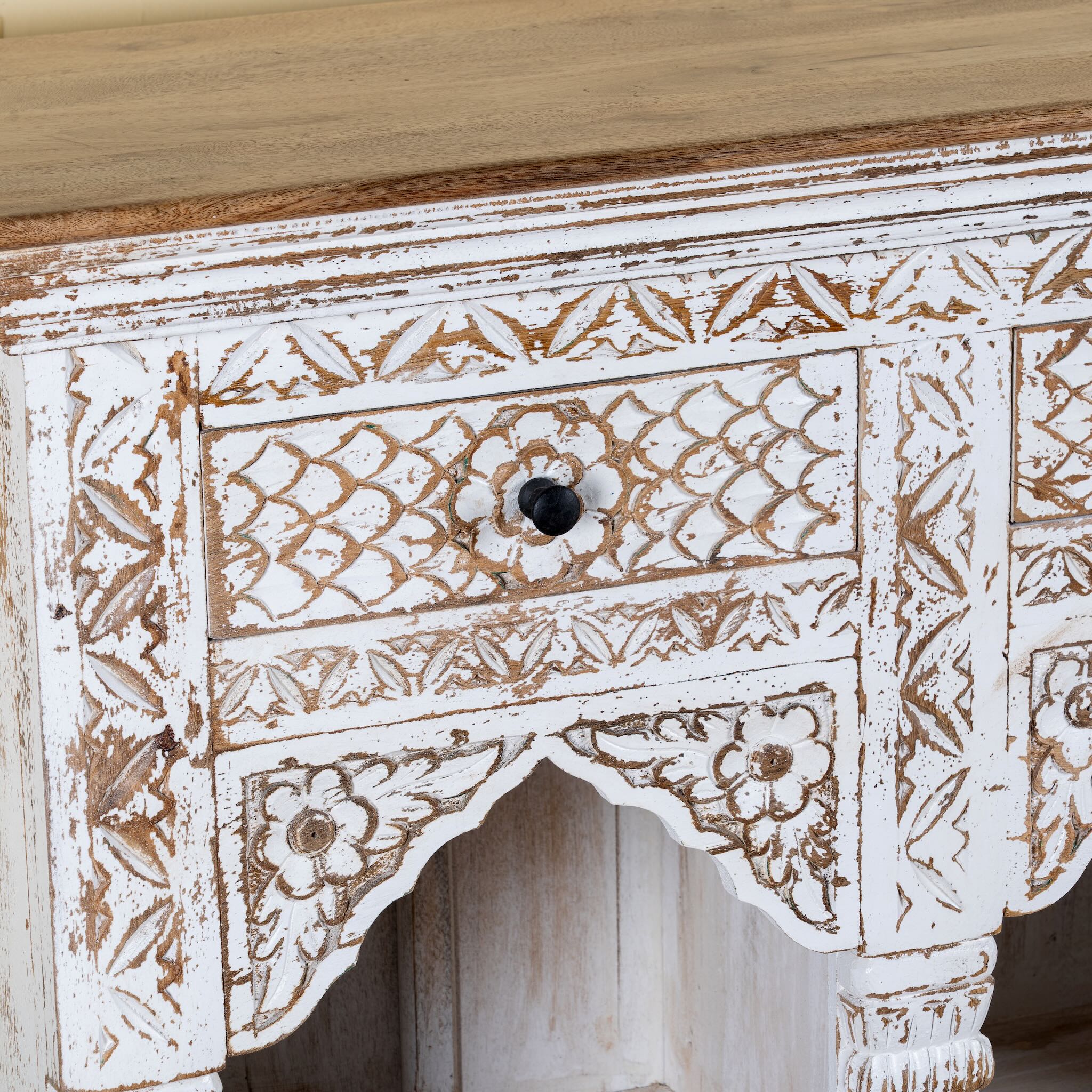 Close up image of a handcrafted mango wood shelving unit with balanced square design – vintage home accessories display shelf with natural wood finish and artistic expression.