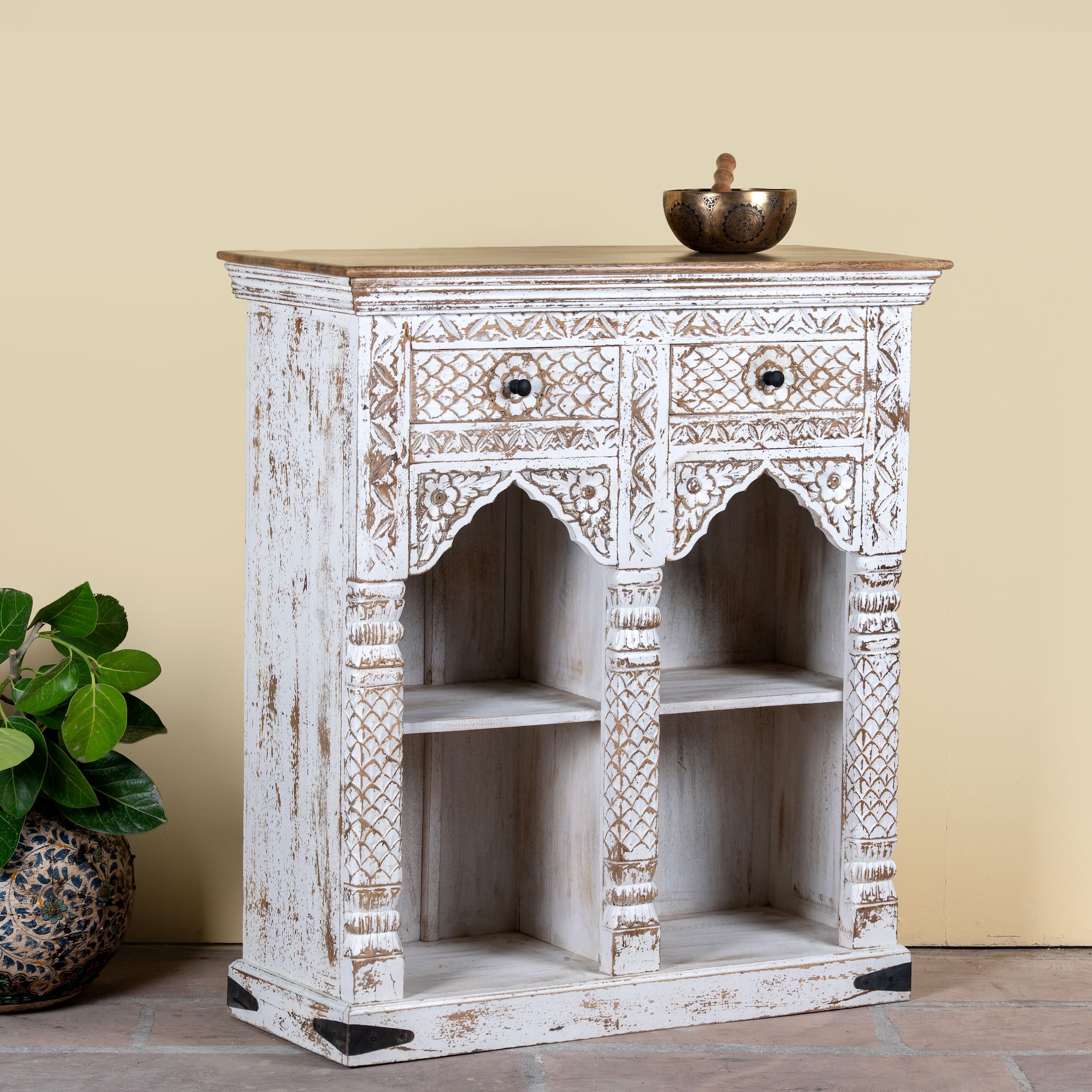 Side angle image of a handcrafted mango wood shelving unit with balanced square design – vintage home accessories display shelf with natural wood finish and artistic expression.