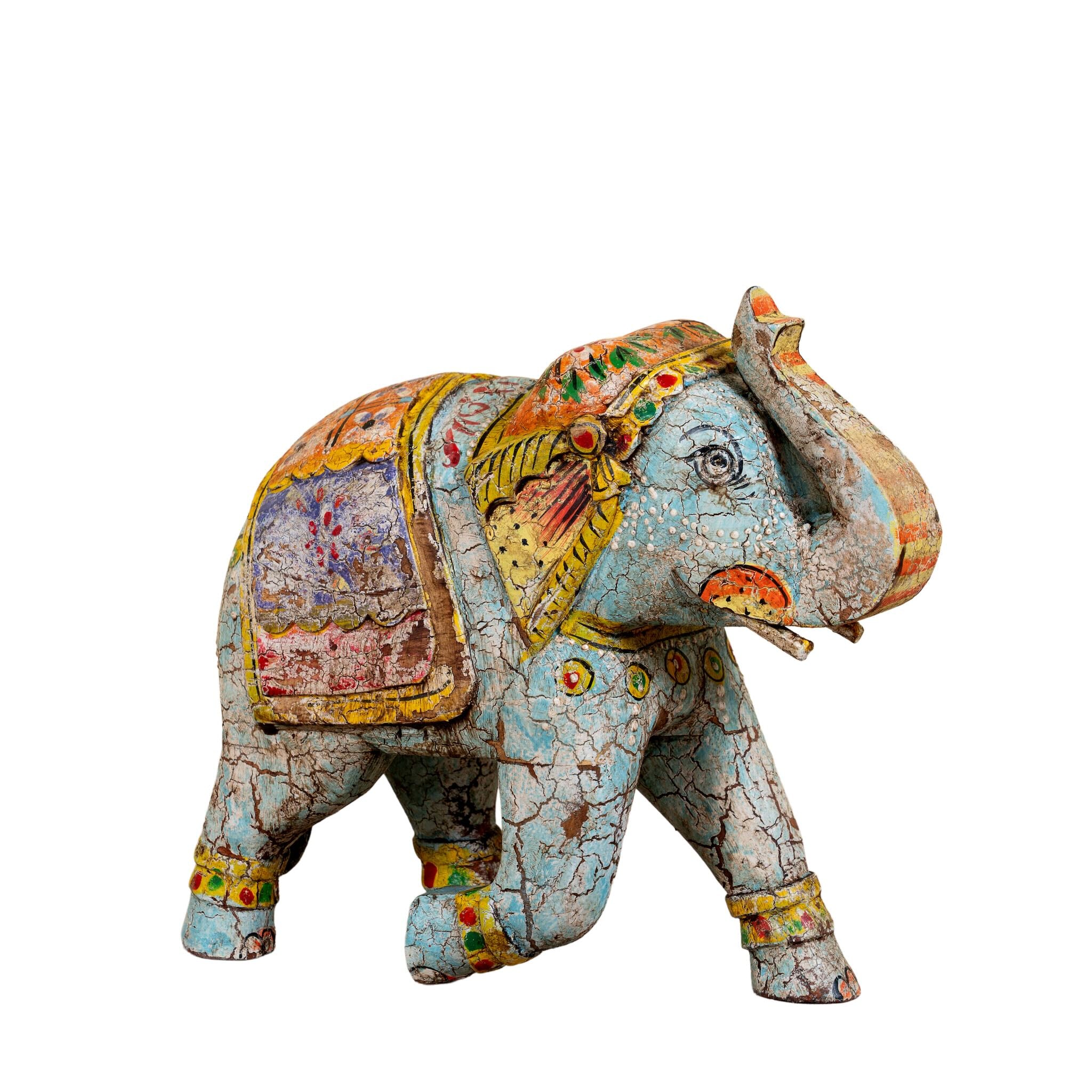 Decorative elephant figurine with colorful patterns on a white background