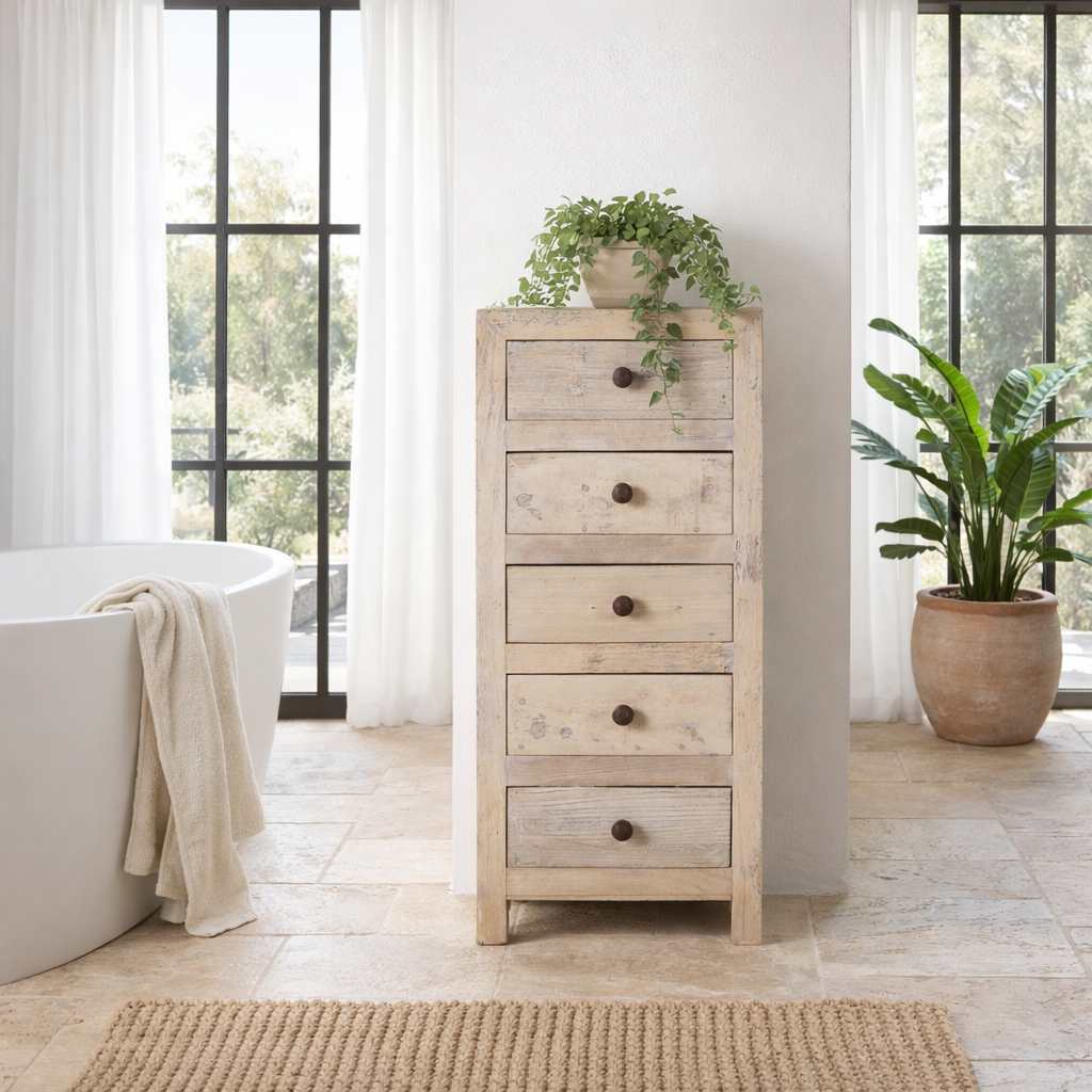 Lifestyle imagination of a chest of 5 drawers made from reclaimed wood with rustic finish; Ibiza style sustainable furniture, 50 × 35 × 110 cm.