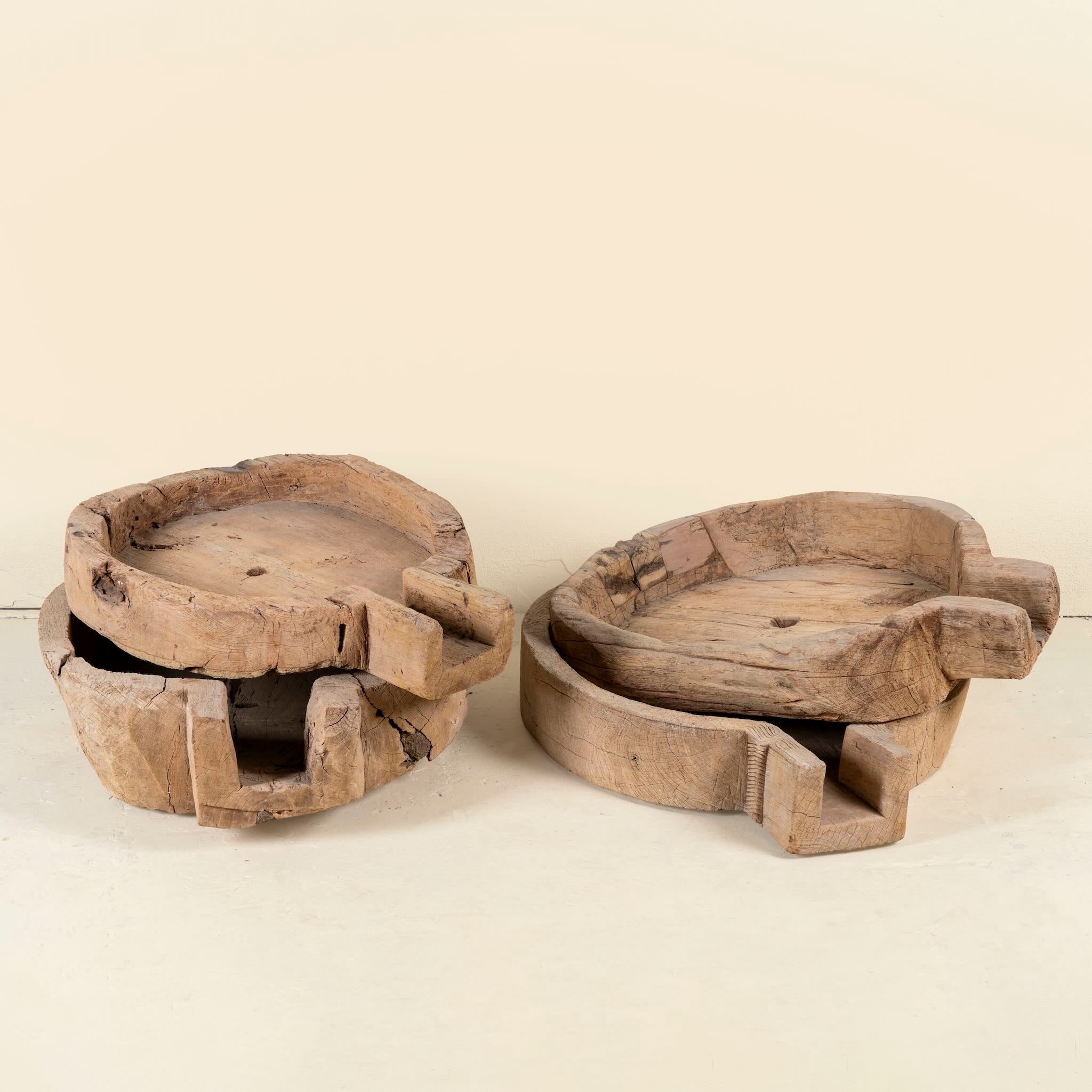 Antique teak wood oil grinder Jai with natural patina and hand-carved form. A vintage home accessory and unique Indian decoration ideal as a planter or entryway piece in vintage home decor settings.