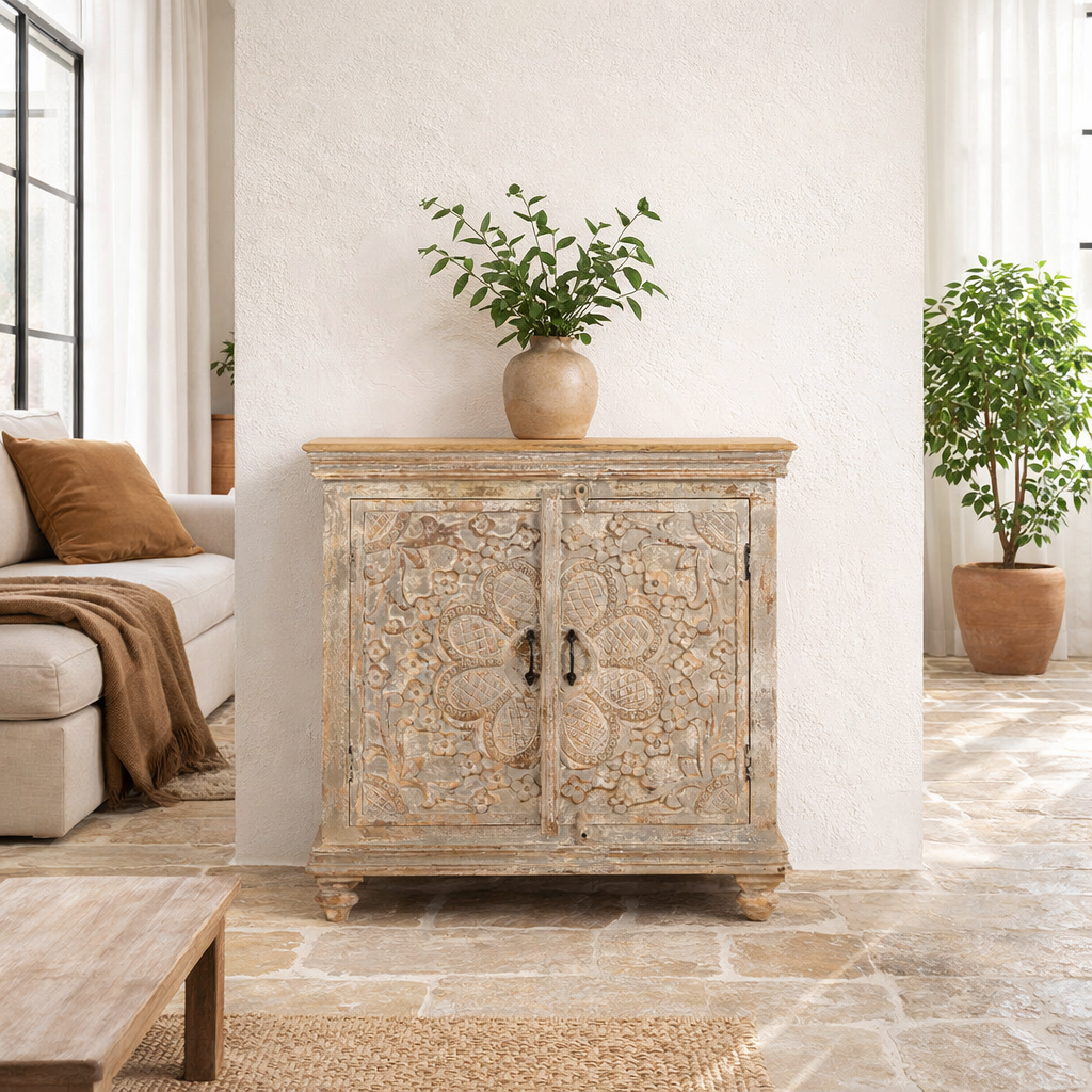Lifestyle image of a square carved wood sideboard with whitewashed floral detailing; ideal as living room furniture, 90 × 90 × 40 cm.