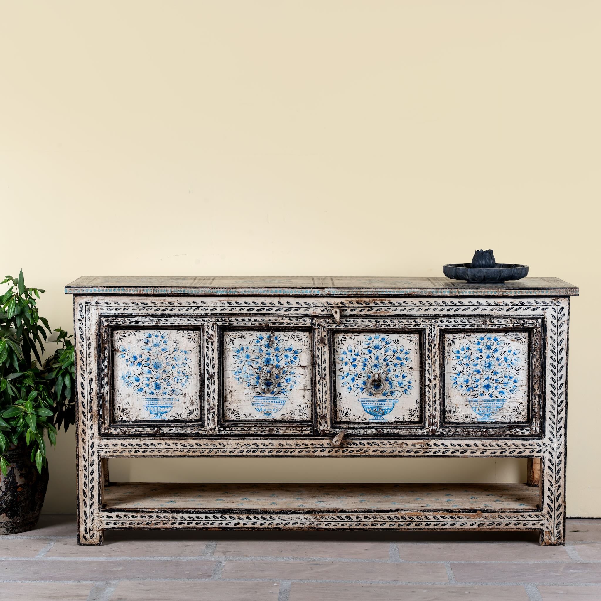 Image of a hand painted console table with 2 doors and plenty of inside storage made of reclaimed old wood in Boho style.