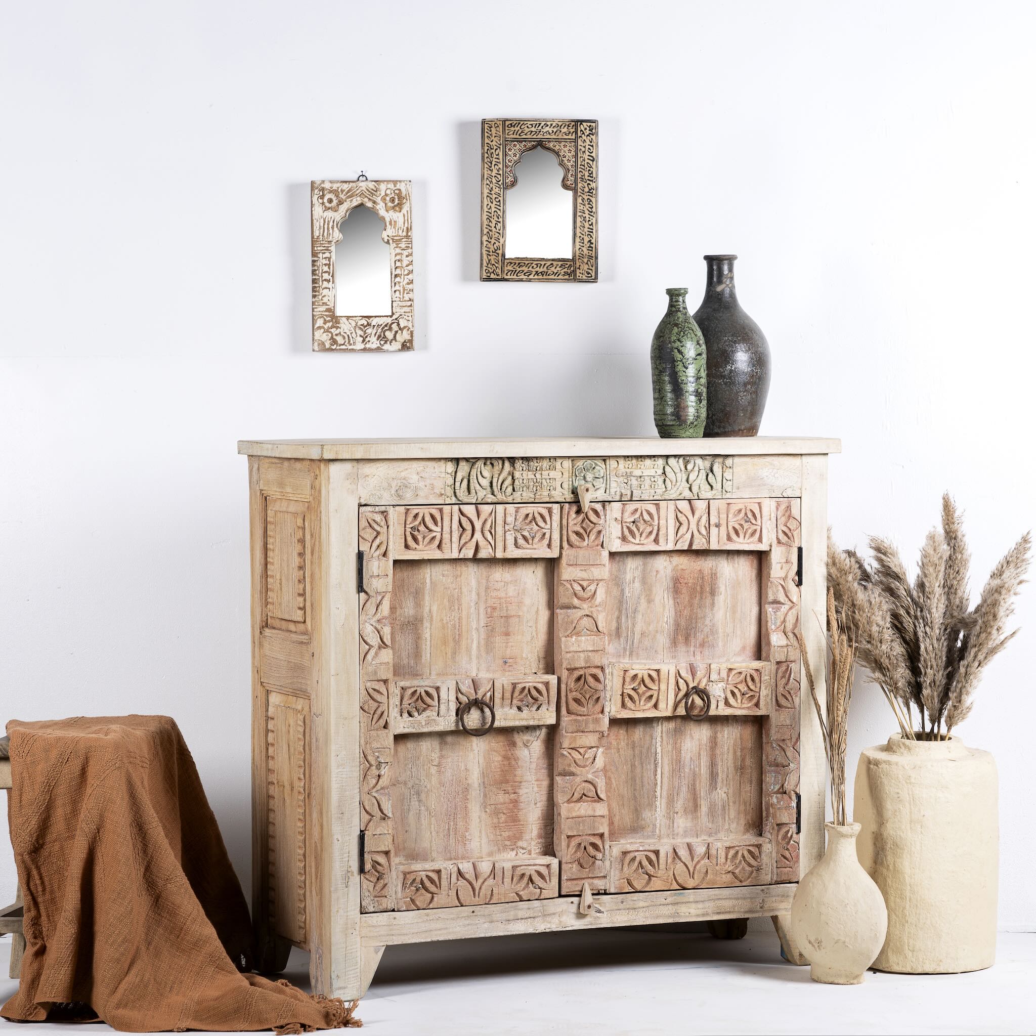 Side angle image of a sandblasted reclaimed teak sideboard in Ibiza style, featuring sandblasted old wood surfaces and rustic design; 112 × 90 × 50 cm.