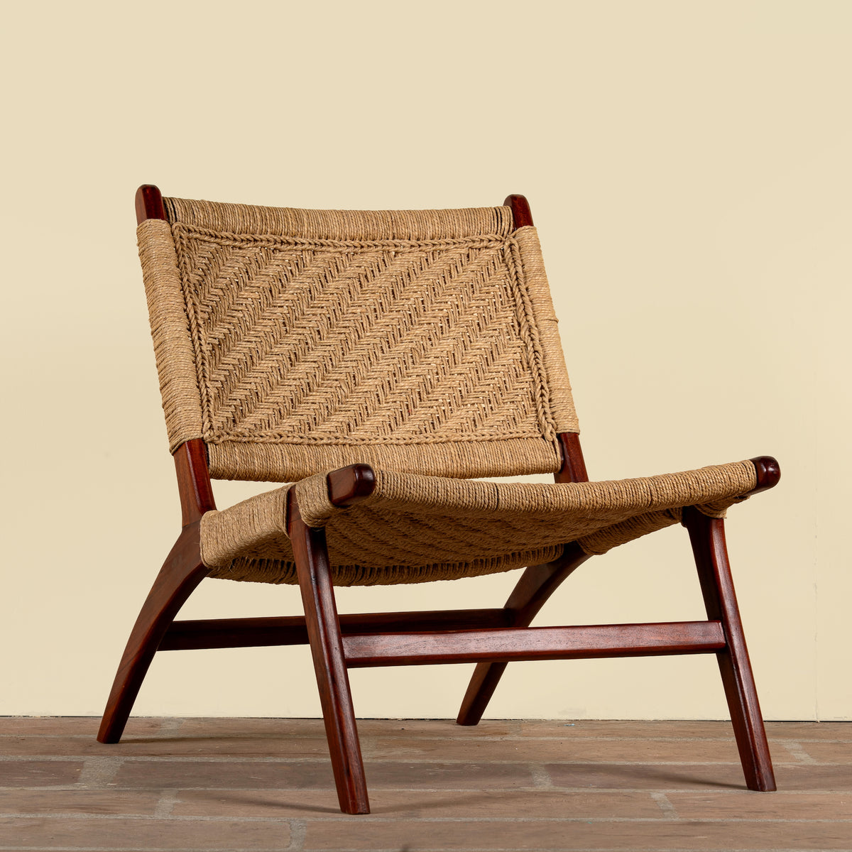 Close up image of the under seating of a Keya solid acacia wood chair with handwoven natural seagrass seat and backrest 95cm