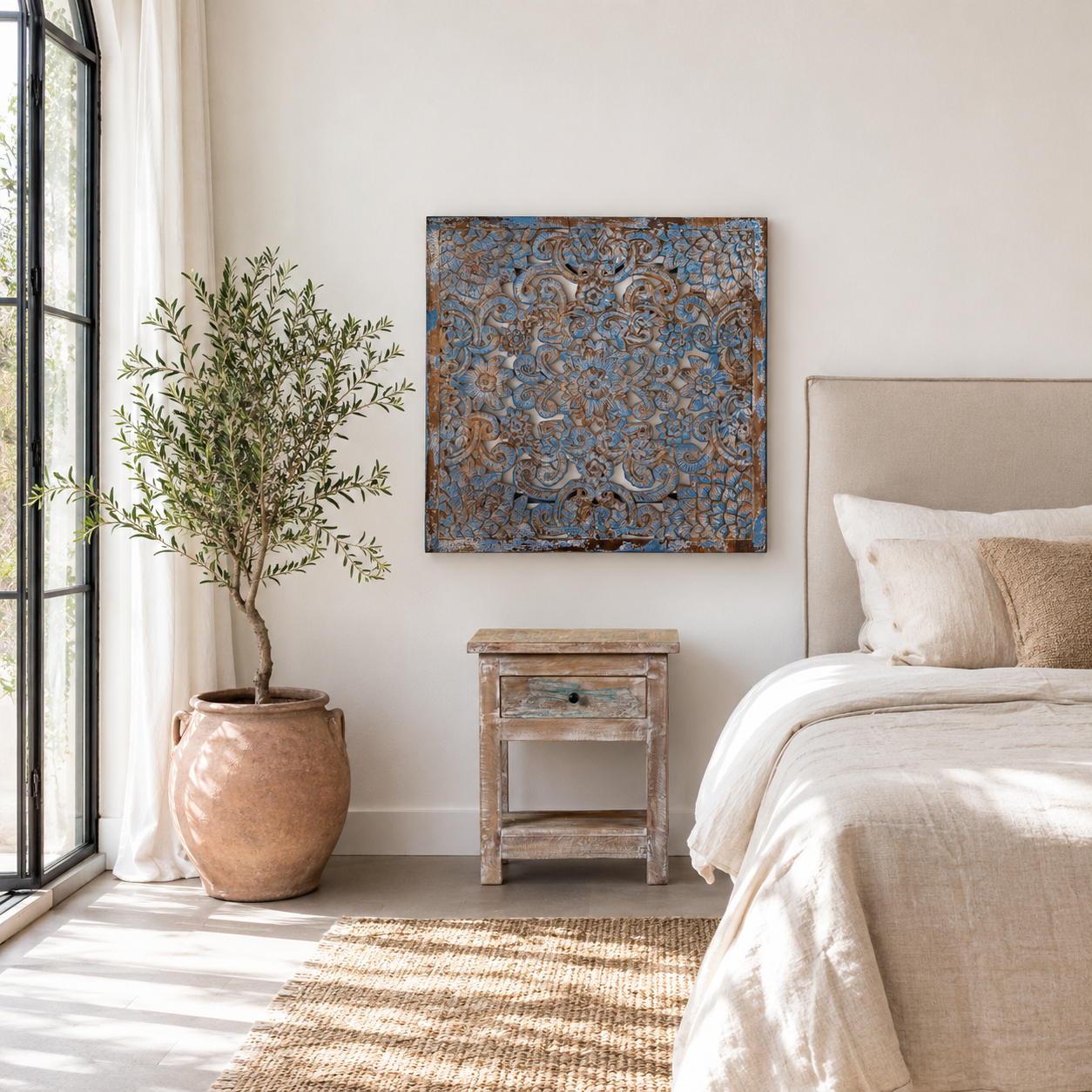 Lifestyle image of a Linda carved wooden wall panel made from mango wood with detailed floral carvings—an elegant wooden wall decoration featuring natural grain and artisan craftsmanship.