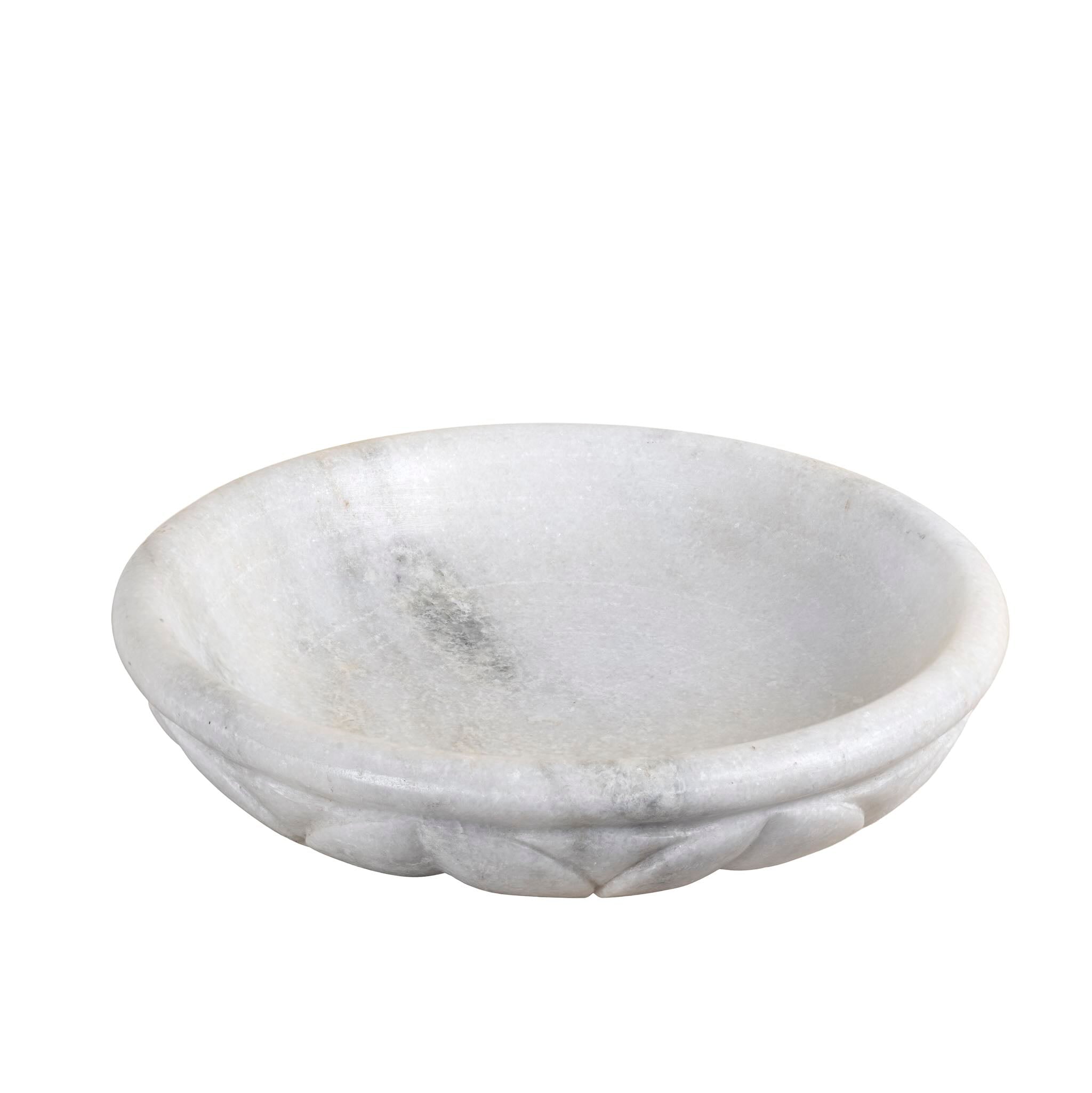 White background image of a hand-carved white marble bowl Padma with lotus flower design. A vintage home accessory perfect for styling in vintage home decor with natural stone craftsmanship and soft grey veining.