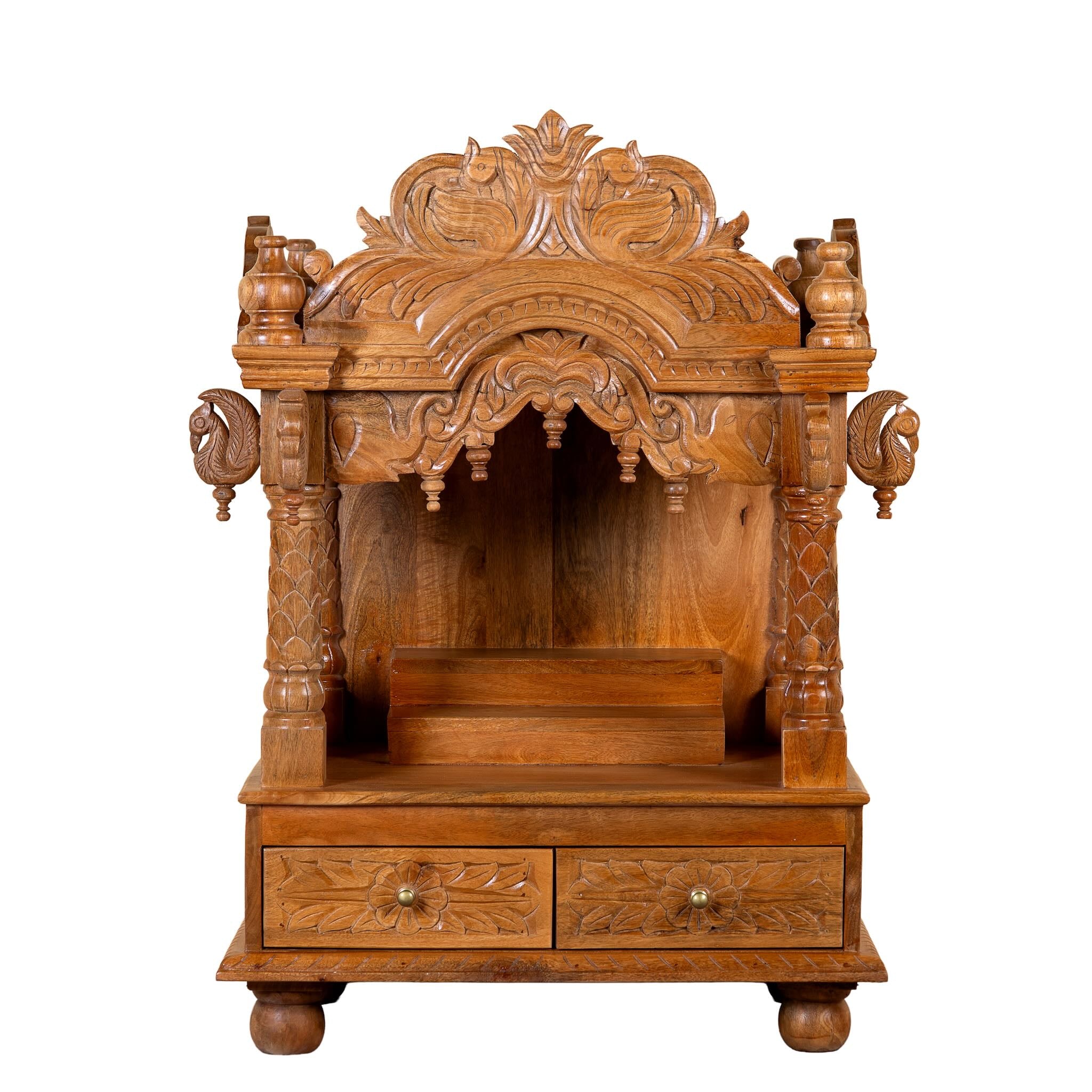White background image of a Meher hand carved mango wood mandir with traditional Indian temple details and two small drawers.