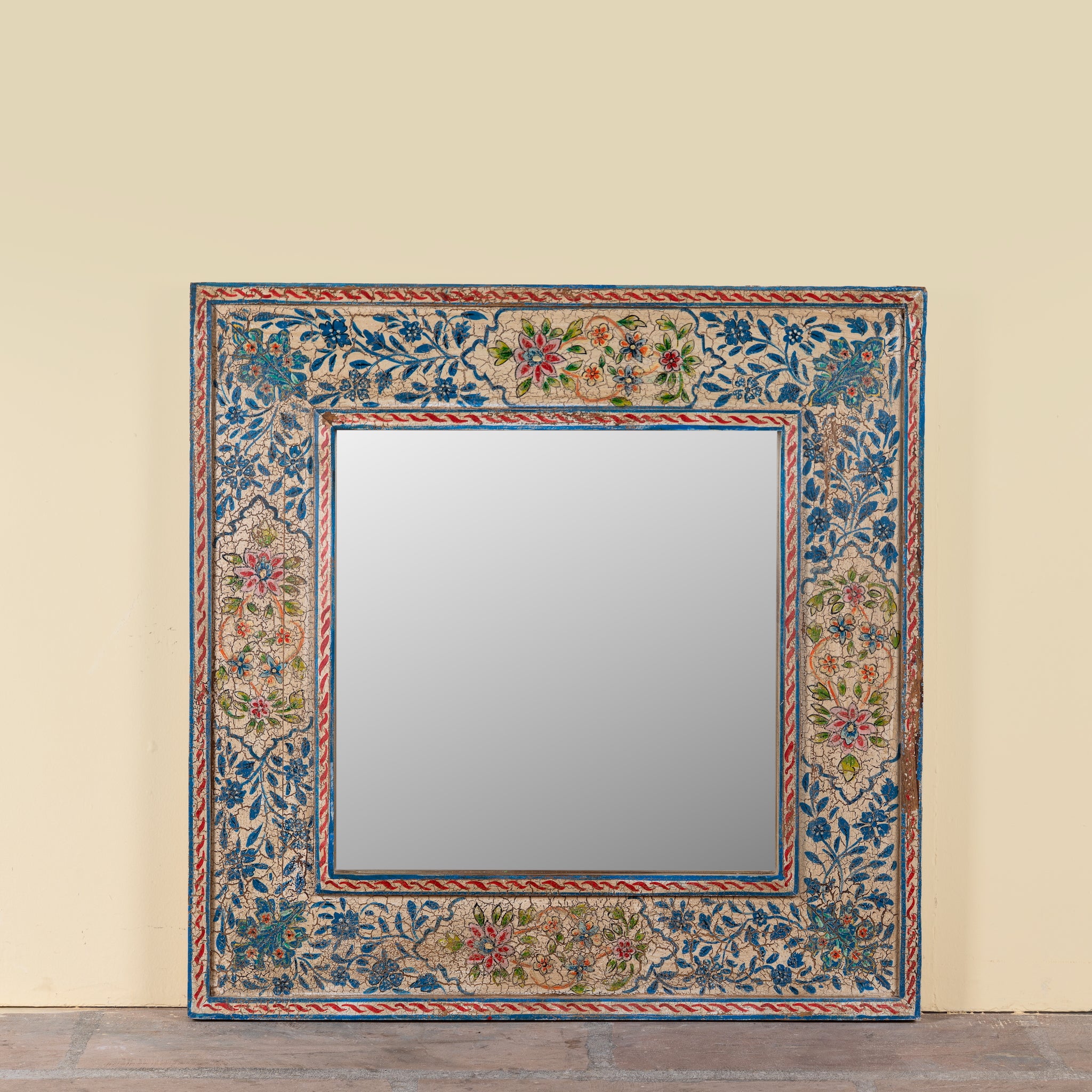 Mishika hand-painted reclaimed wood wall mirror with intricate blue floral artwork and traditional Indian decorative motifs, 90x90x5cm.