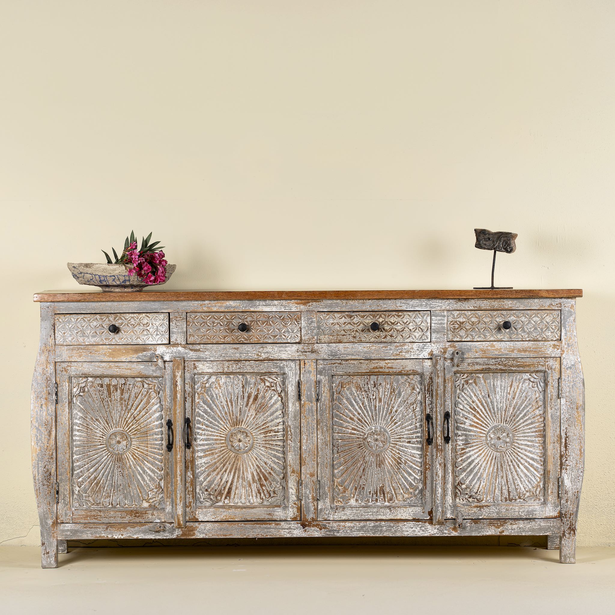 Living room furniture sideboard made from hand-carved mango wood, vintage style furniture with sunburst patterns and distressed finish, 180 × 40 × 90 cm.