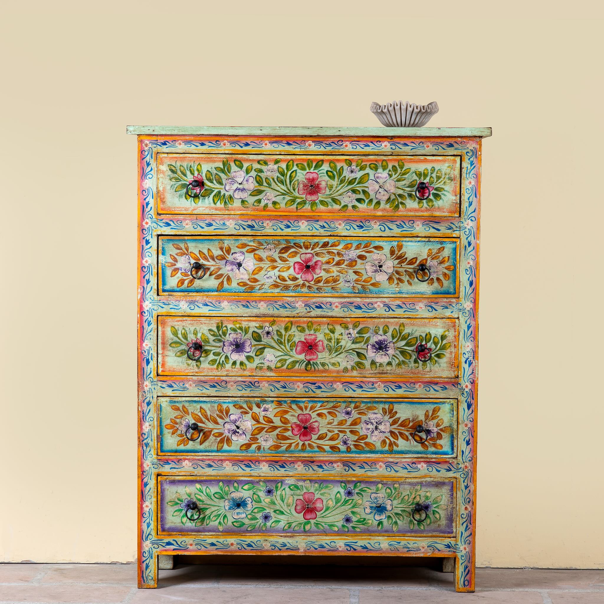 Neel hand painted reclaimed wood chest of drawers with five floral drawers and colourful boho vintage finish.