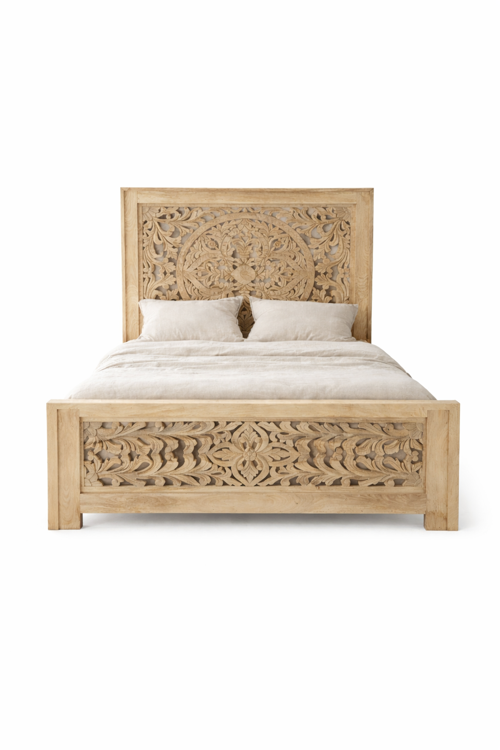 White background image of a Panel bed Nidhi made from solid mango wood with tall carved headboard, shown in sandblasted bleached finish. A handcrafted piece of bedroom furniture inspired by beds from India.