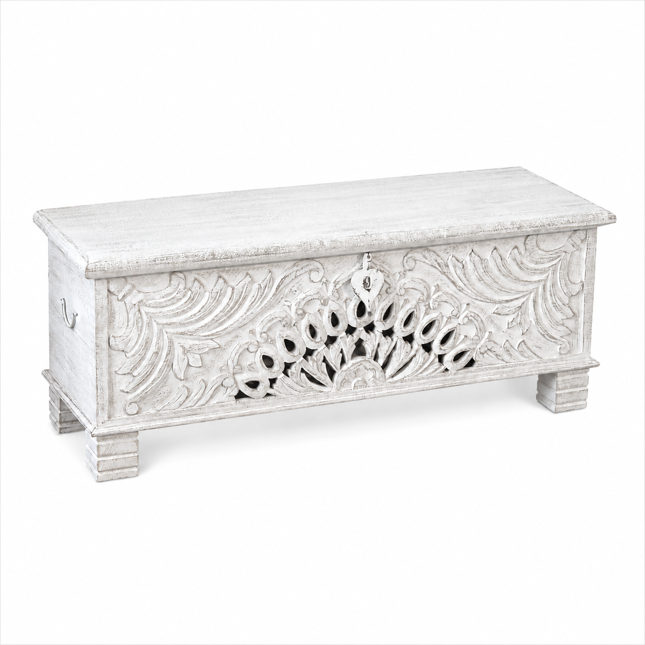 Side angle image of a Hand-carved mango wood vintage chest with floral detailing – a one-of-a-kind mango wood chest ideal for Mediterranean-inspired interiors.