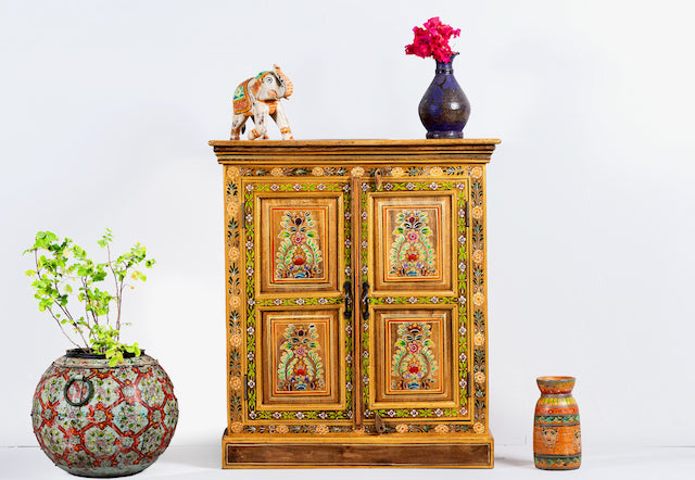 Image of a hand painted reclaimed wood cabinet with floral design in vintage style.