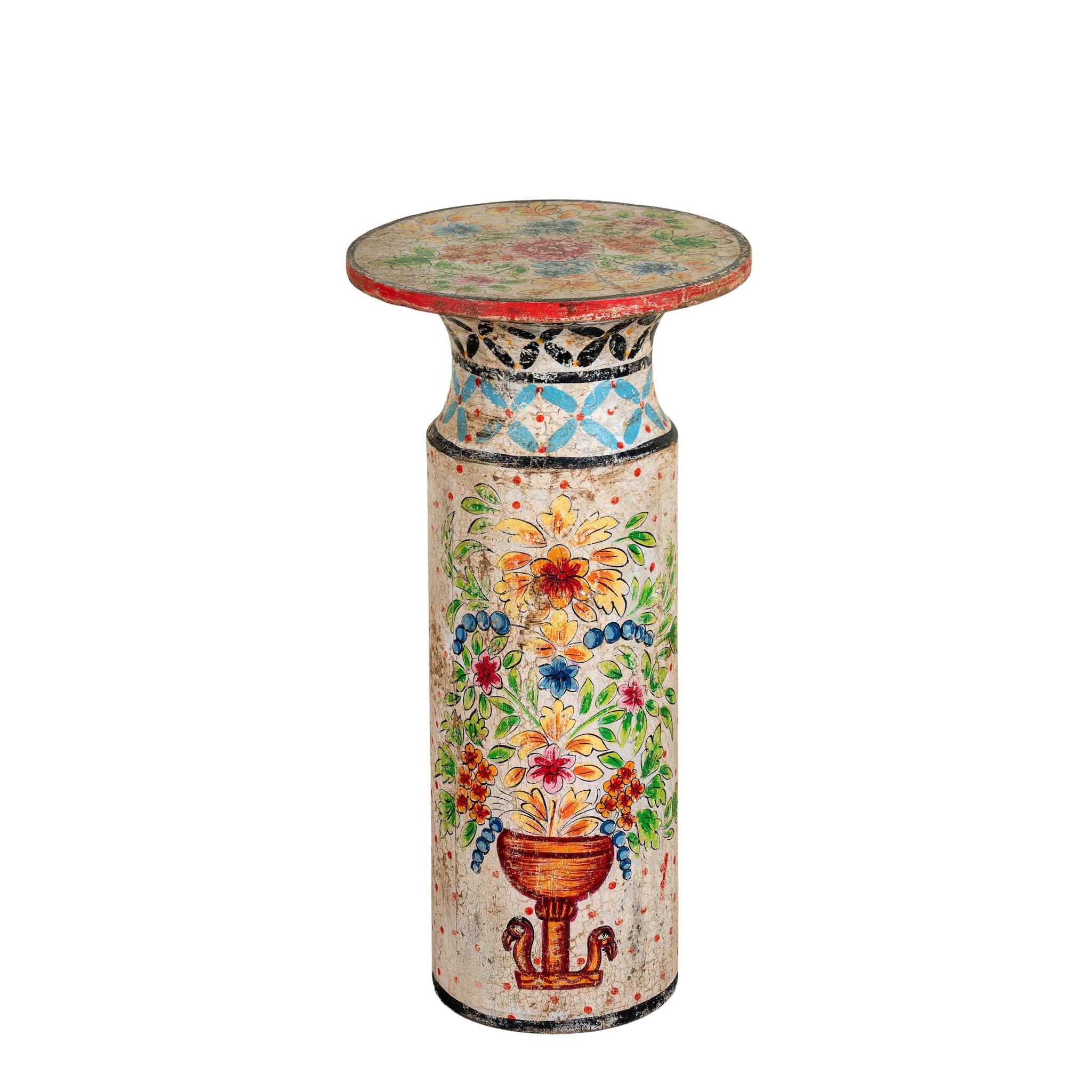 White background image of a Hand‑painted wooden side table with floral motifs in vibrant colours, perfect for bohemian interiors and artisanal furniture displays.