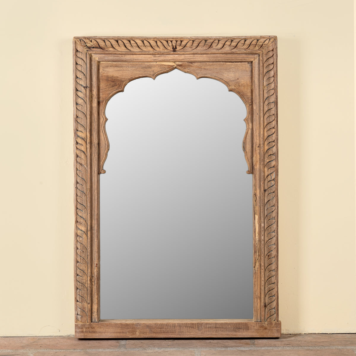 Ronavraj reclaimed teak wood mirror made from an old Indian window frame with carved border and shaped arch, 82x121cm