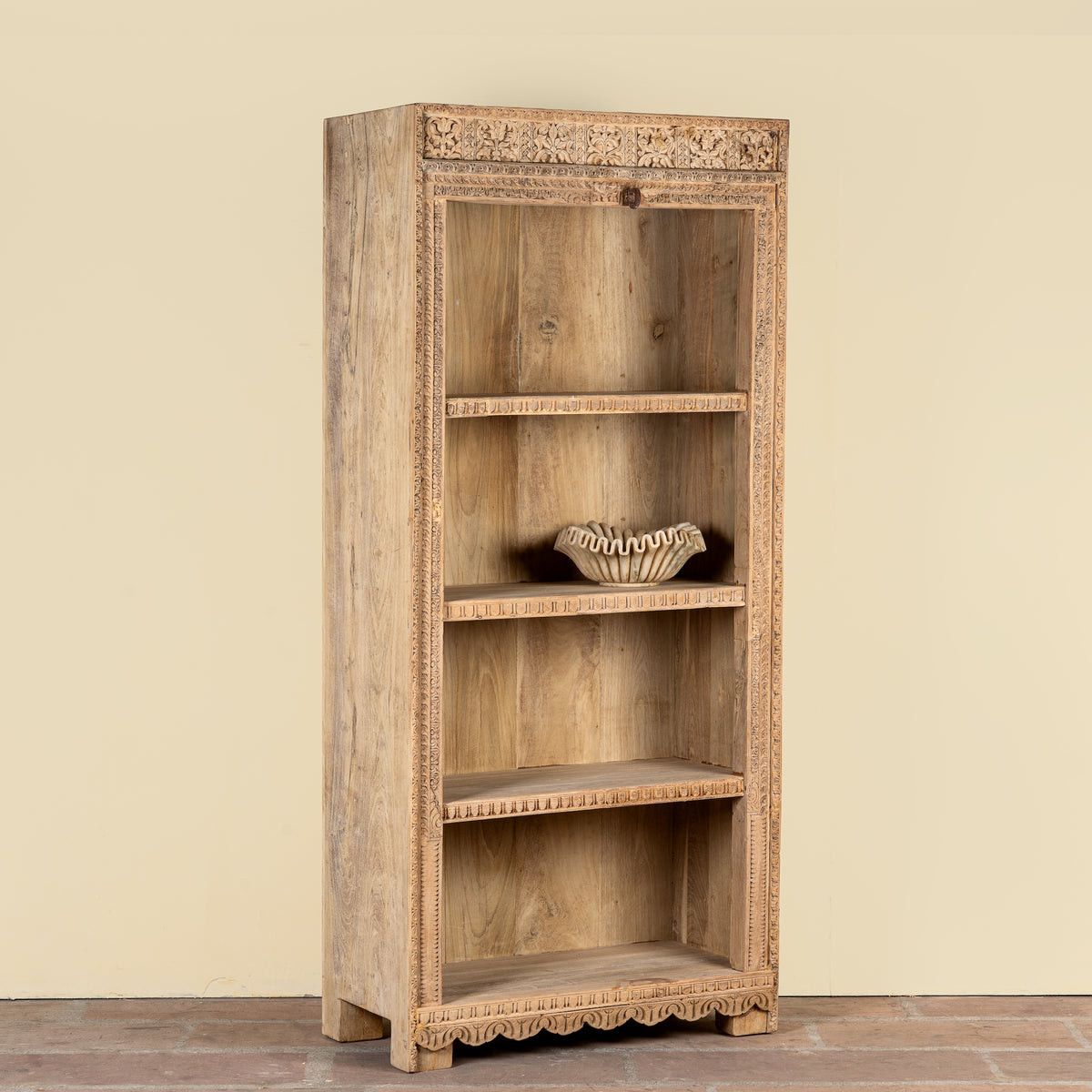 Side angle image of a Sagar hand carved reclaimed teak wood shelving made with an old teak door frame and four open compartments 180cm