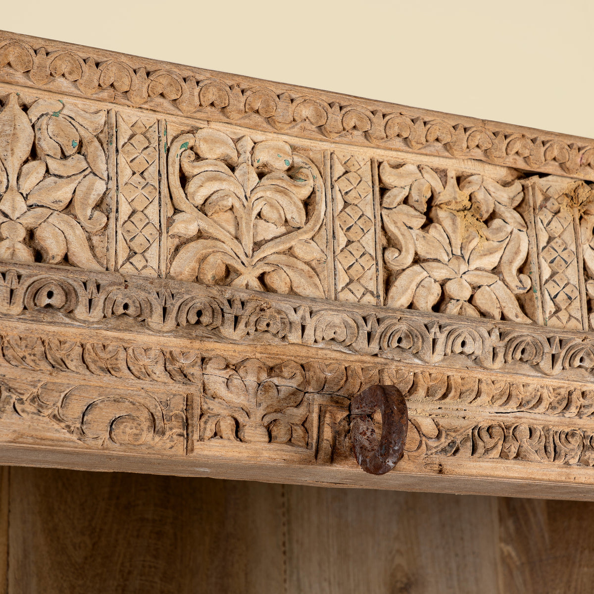 Close up image of a Sagar hand carved reclaimed teak wood shelving made with an old teak door frame and four open compartments 180cm