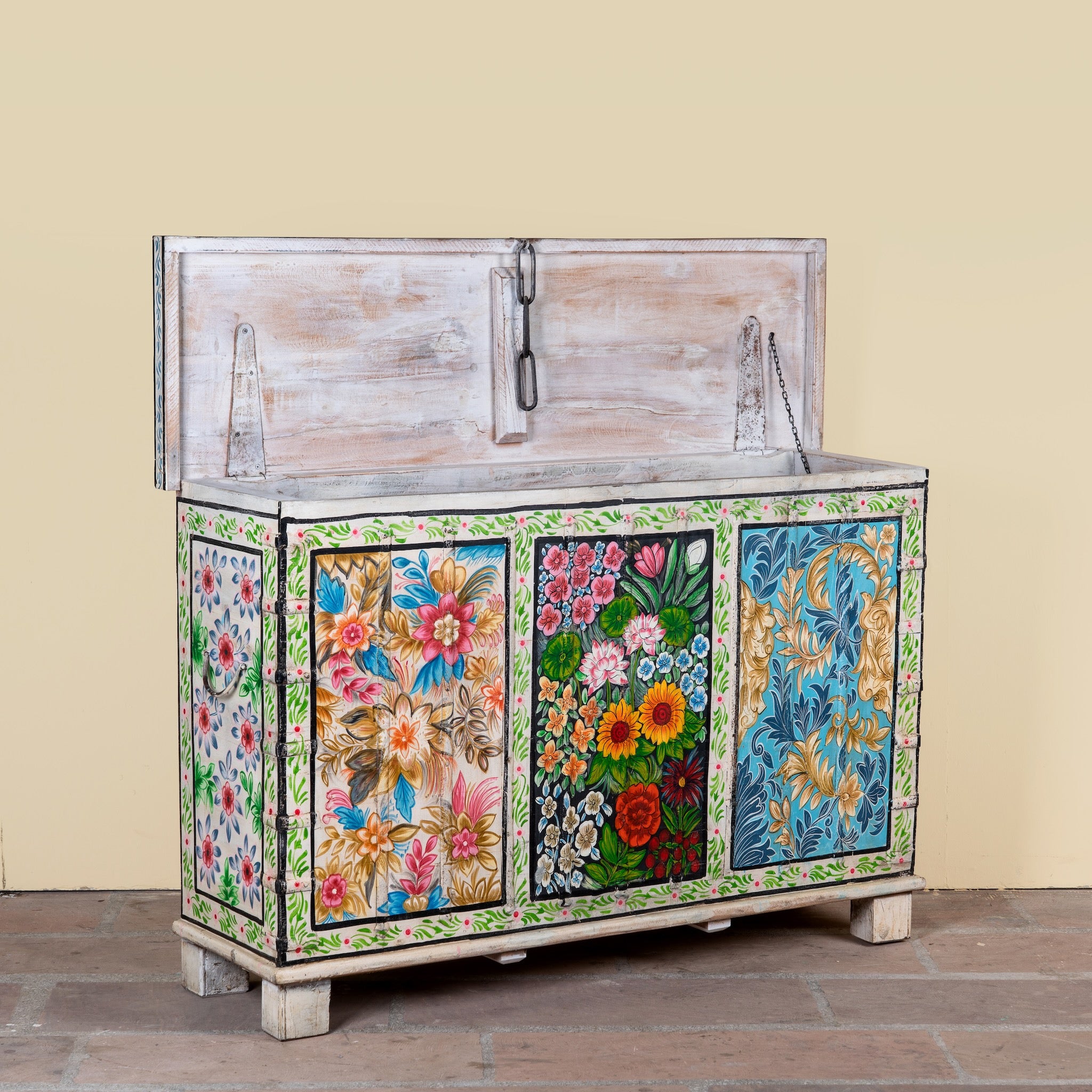 Side angle image with open lid of a Sarina hand painted reclaimed wood storage chest with traditional Indian artwork 120cm