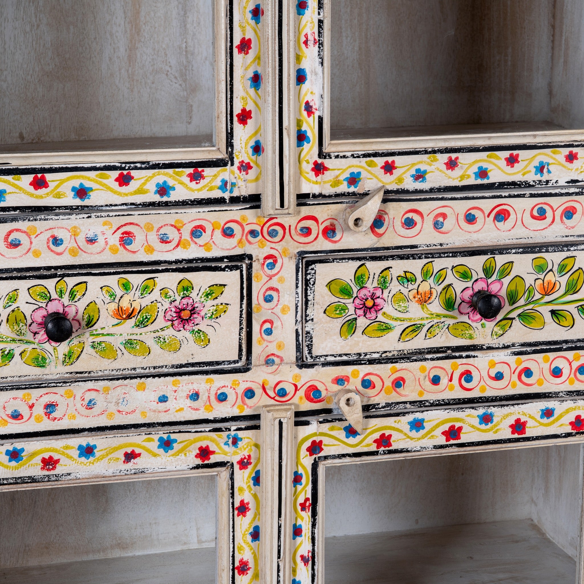Close up image of a Sasha hand painted reclaimed wood display cabinet with glass doors 150cm