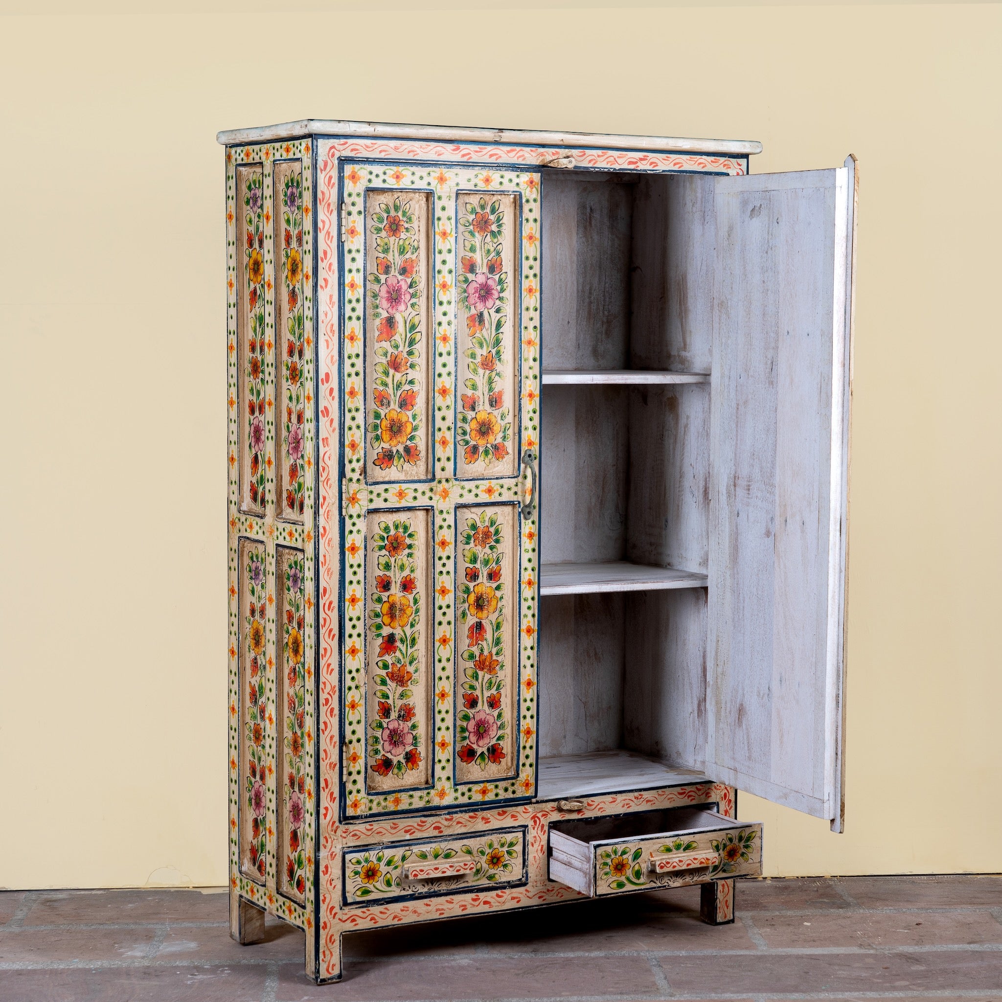 Side angle image with open door of a Smaya hand painted reclaimed wood Boho cabinet with floral artwork 152cm