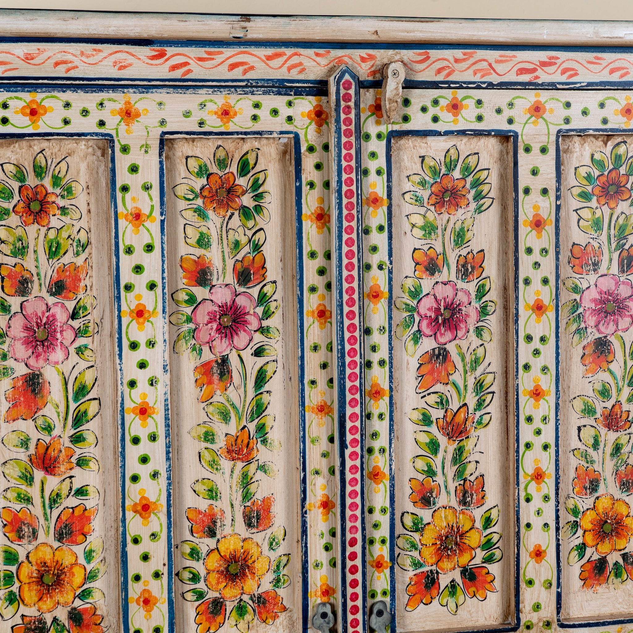 Close up image of a Smaya hand painted reclaimed wood Boho cabinet with floral artwork 152cm