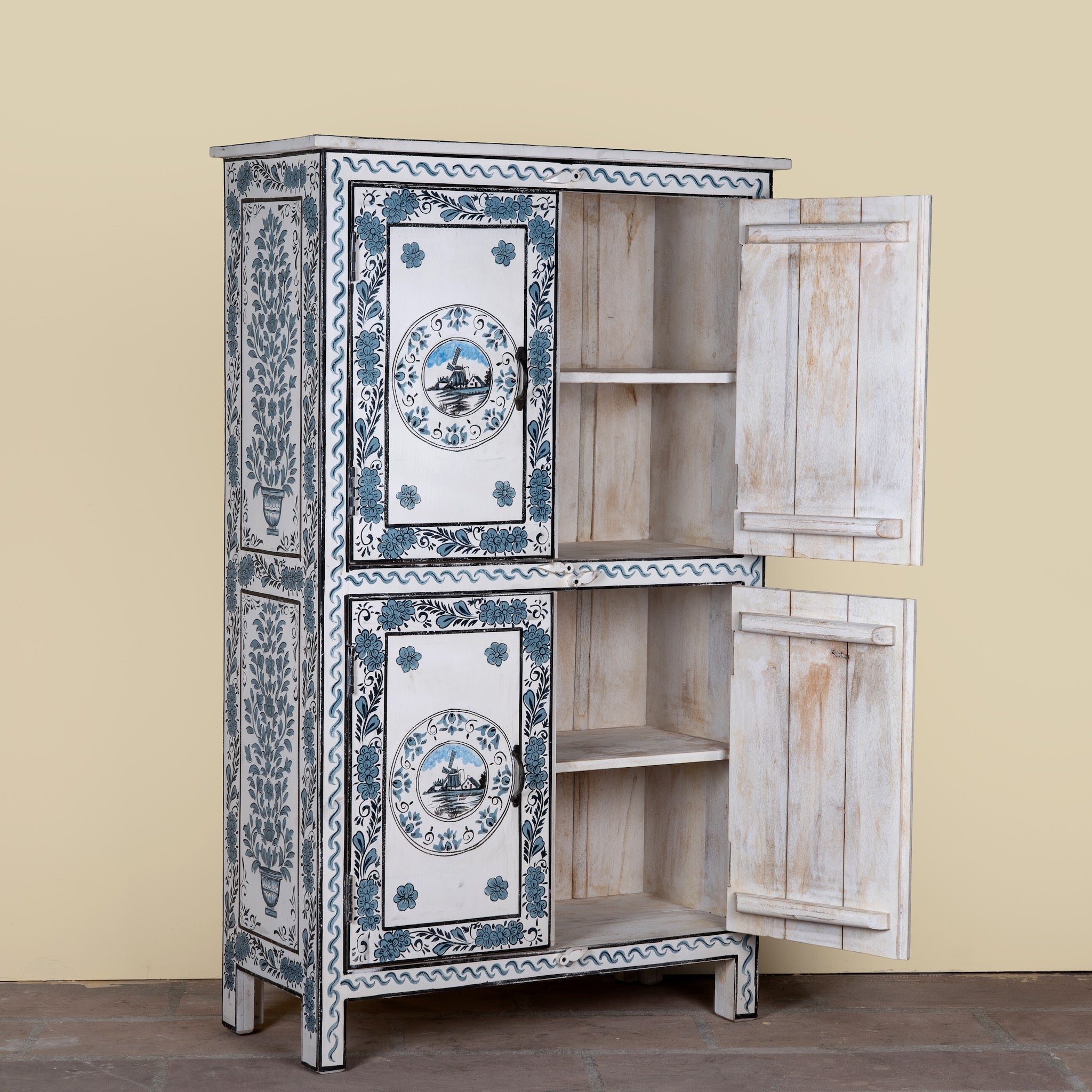 Side angle image with open door of a Srika limited edition hand painted reclaimed wood cabinet inspired by Delft porcelain 150cm