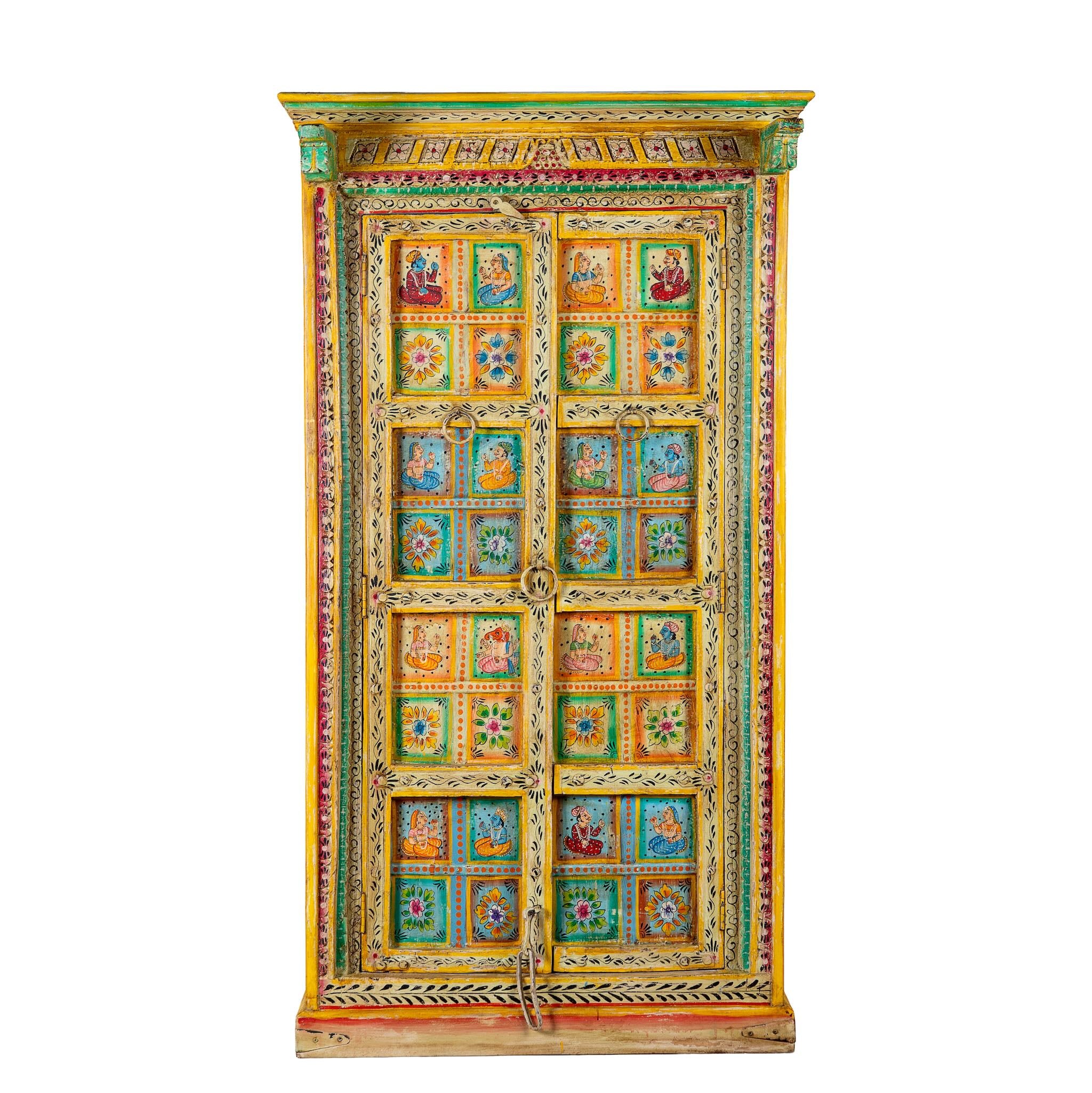 White background image of a hand painted wardrobe made of teak wood with floral motifs; unique furniture inspired by Indian artistry, 104 × 50 × 186 cm.