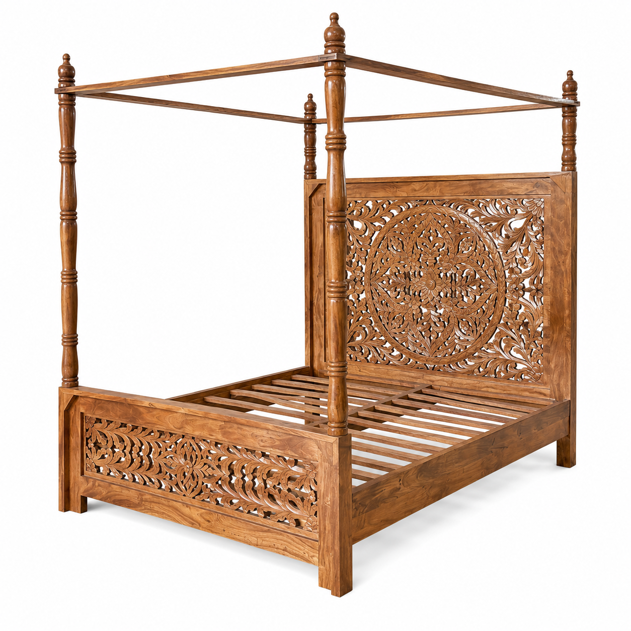 Side angle image of a Vishika hand carved mango wood four poster bed with teak finish, ornate floral carved headboard and footboard, for 180x200cm mattress.