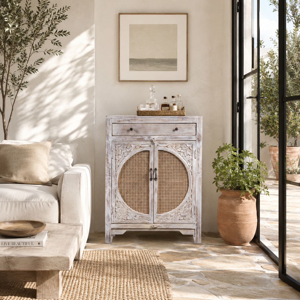 Yamuna White handcrafted mango wood cabinet with whitewashed finish, woven rattan doors, hand-carved Indian detailing, and Scandinavian-inspired design, 104cm.