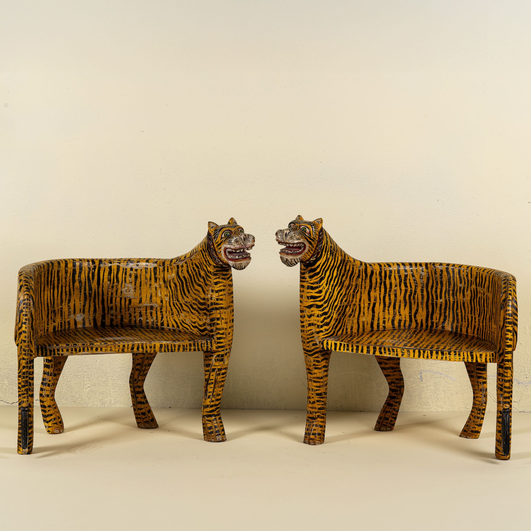 Front view of a hand painted tiger chair made of reclaimed wood, a unique decorative furniture not only for a children room. The head of the chair can be purchased in right or left direction.