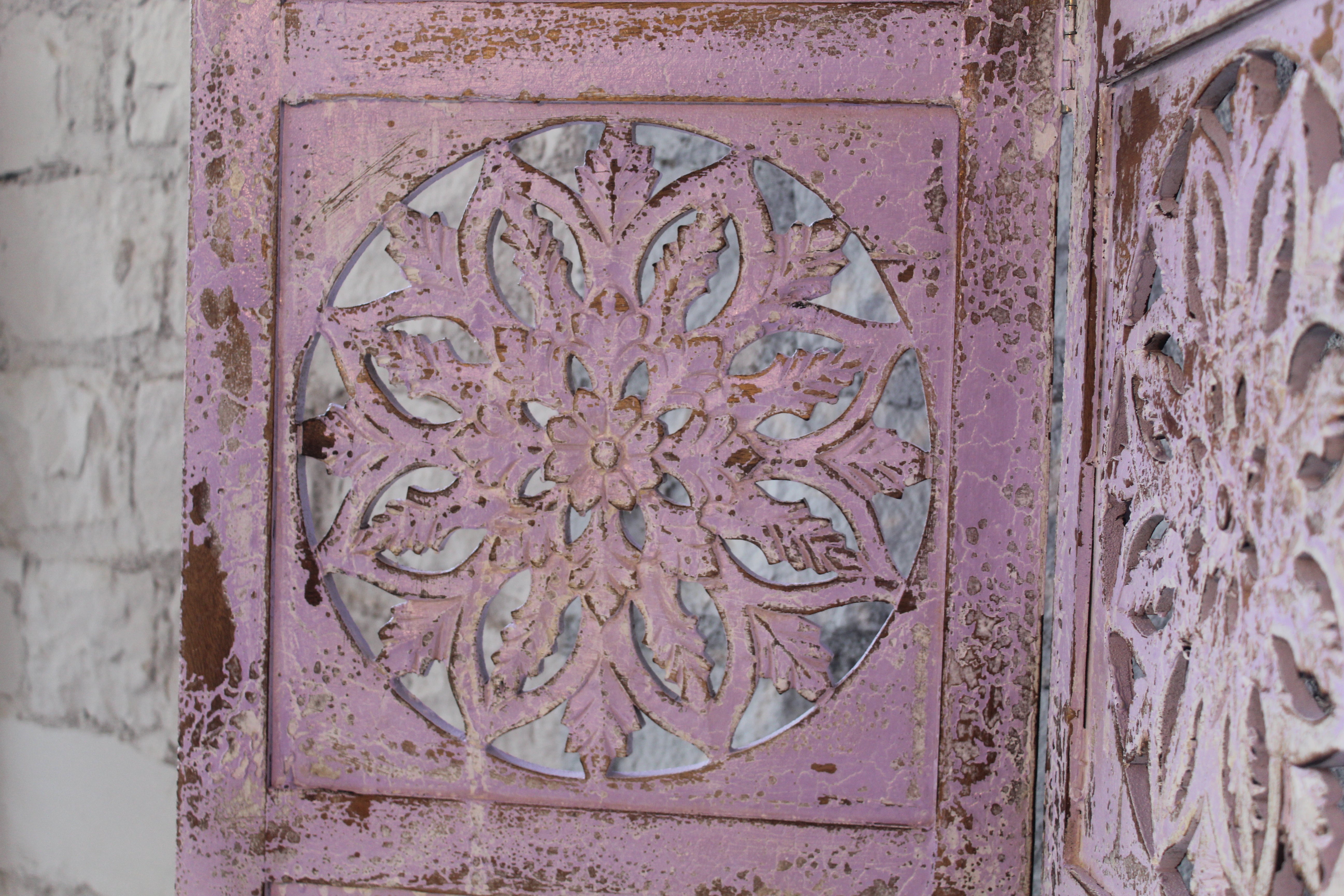 Hand-carved violet mango wood folding room divider with delicate carved patterns, natural variations, and warm boho style for unique interiors.