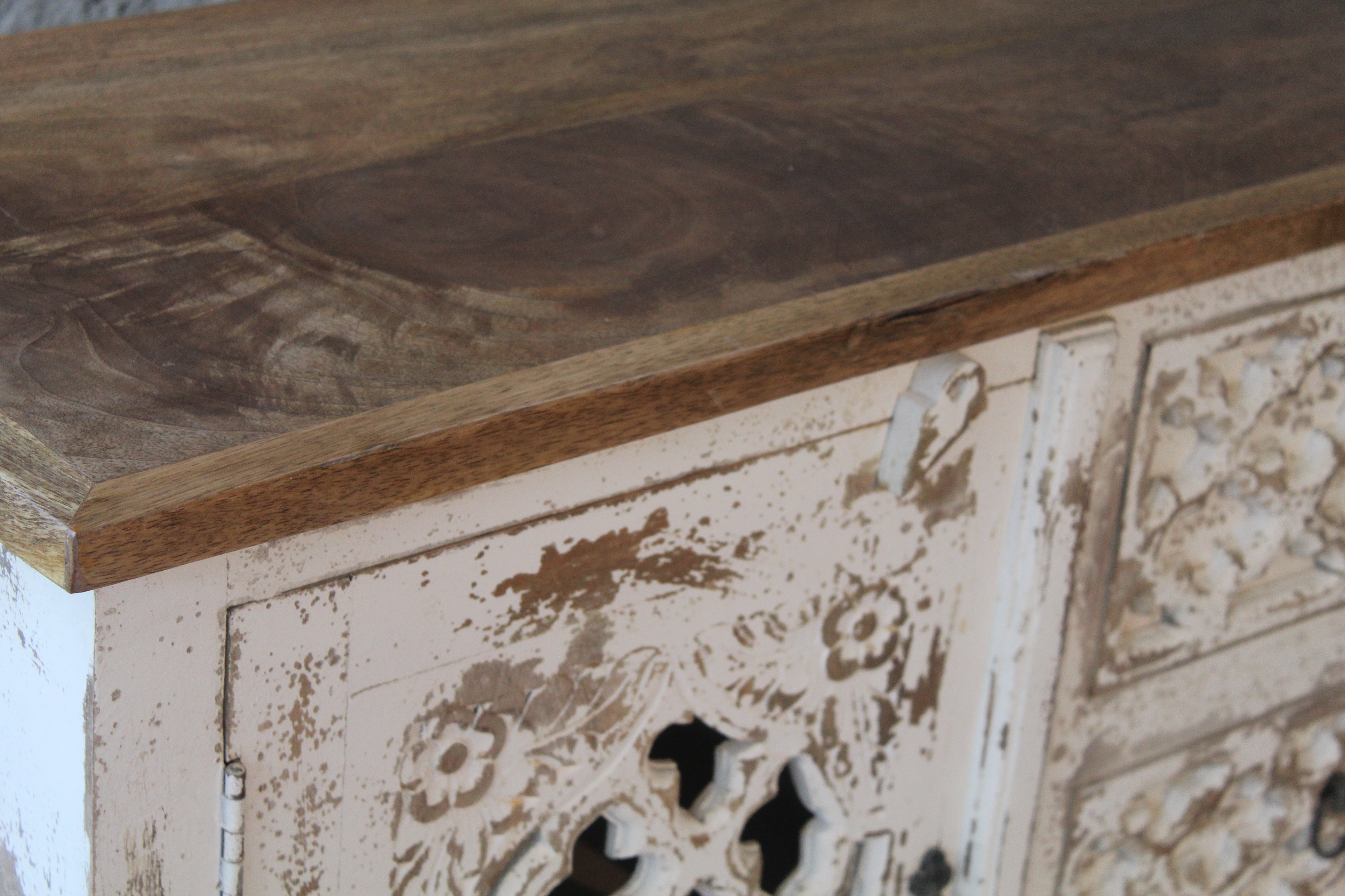 Close up image of a Deepit hand carved whitewashed mango wood sideboard with oriental carved front 150cm