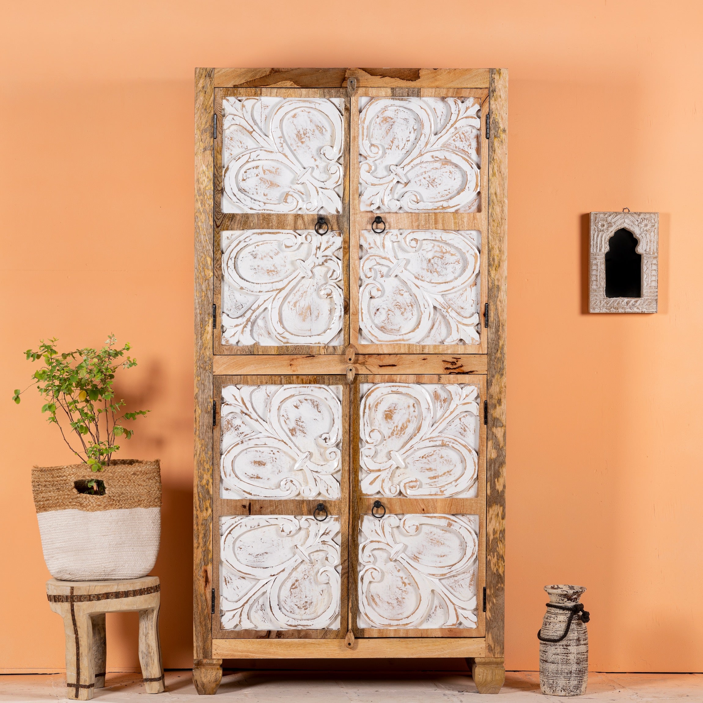 Hand-carved mango wood wardrobe with floral motifs and whitewashed finish; wooden wardrobe ideal for bedroom furniture, 90 × 180 × 40 cm.