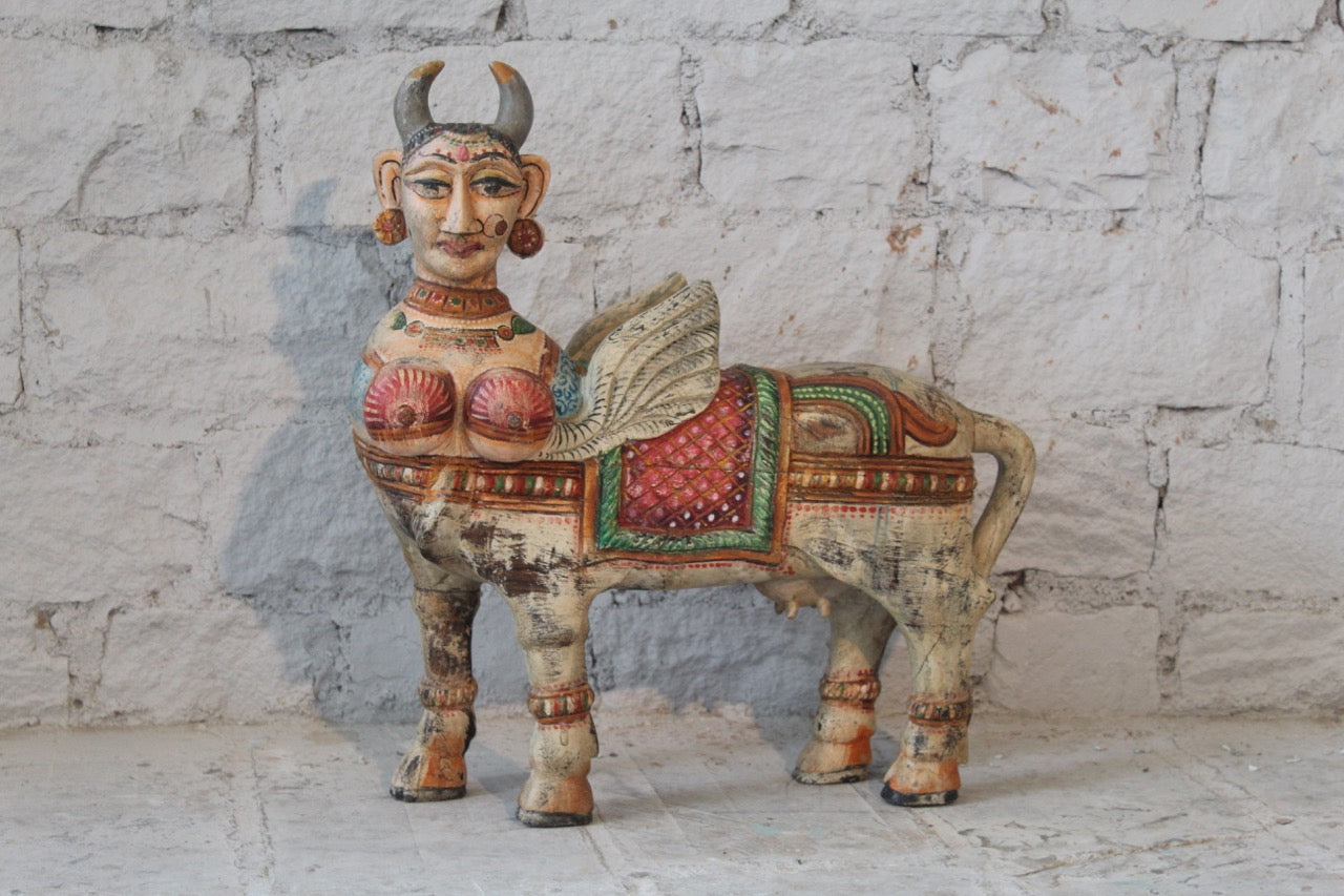 Hand-carved Kamadhenu Indian wooden sculpture made from recycled teak – artistic Indian home accessory with painted detail, 70x40x20cm.