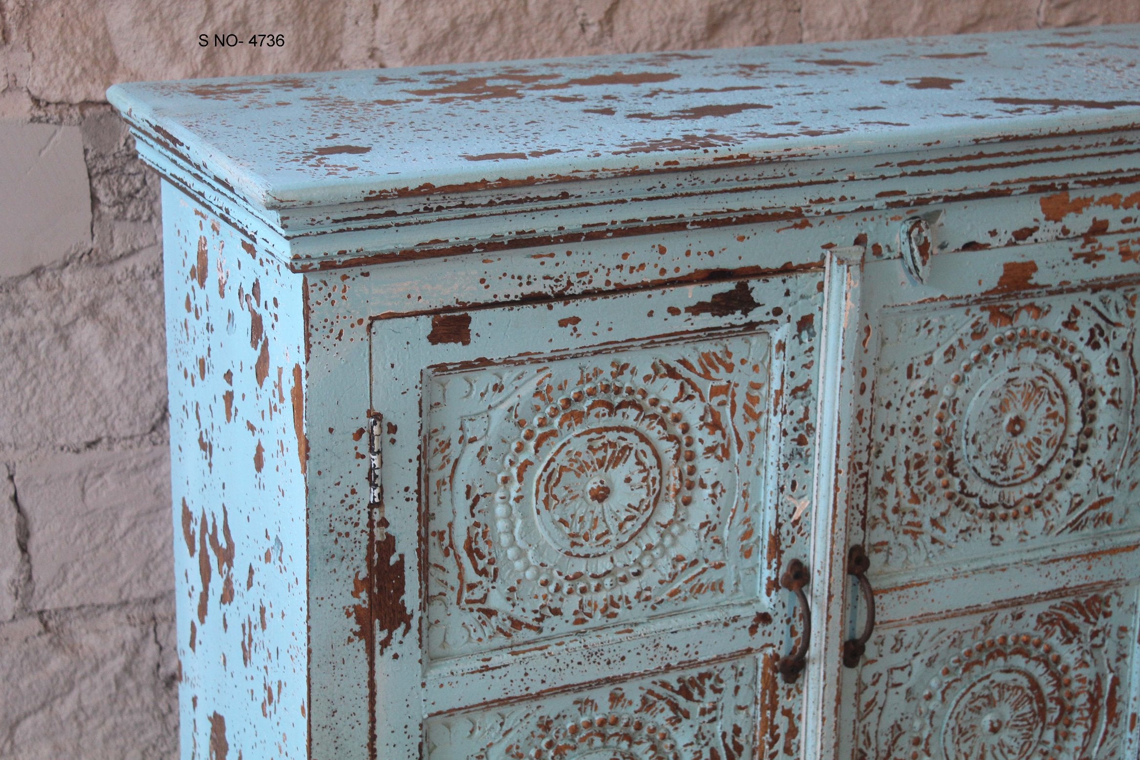 Close up image of a Mandala Blue hand carved mango wood sideboard with floral mandala doors 180cm