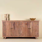 Acacia wood cabinet with hand-carved geometric patterns, artisan carved wood furniture for living room storage, 180 × 40 × 90 cm.