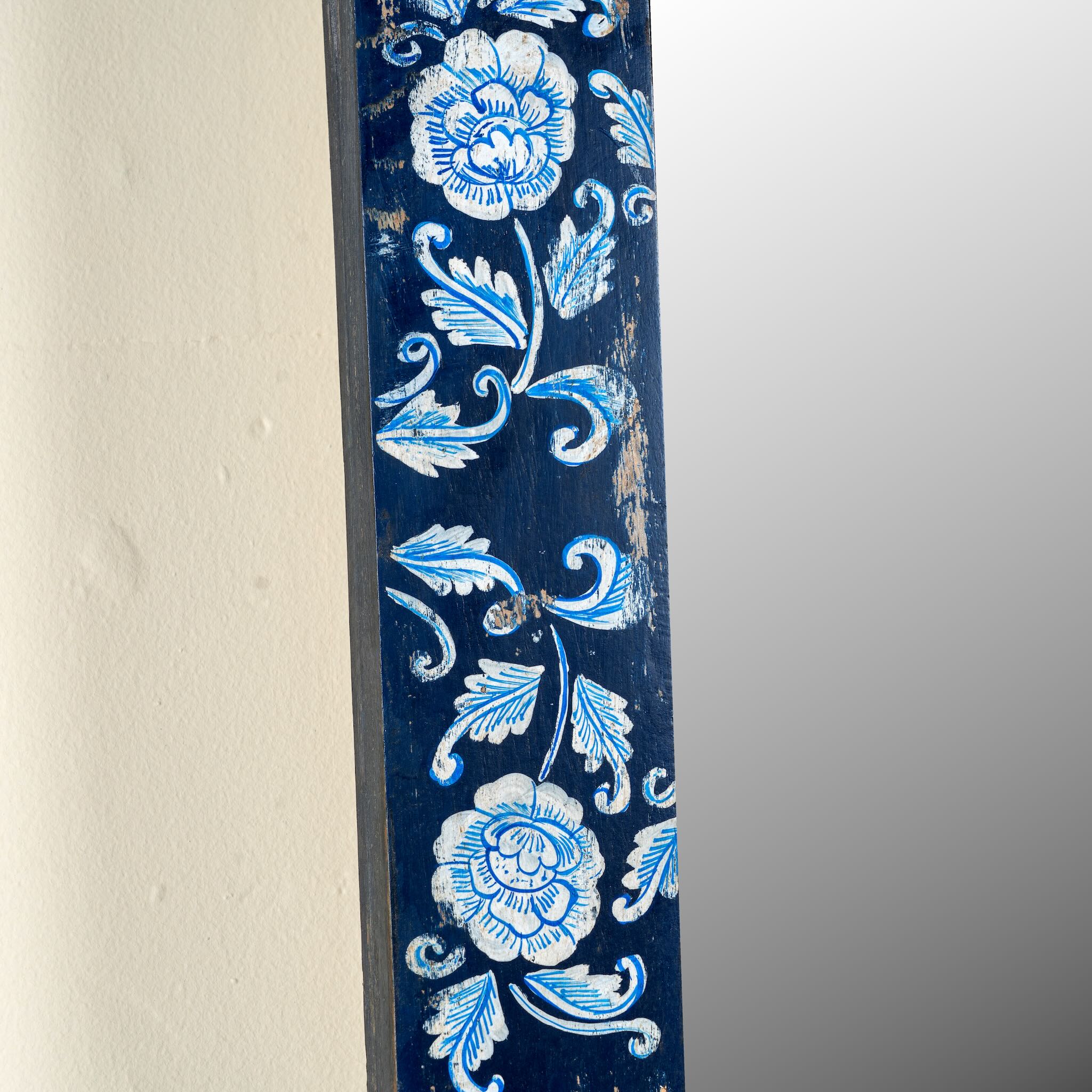 Close up image of a Aagam hand painted reclaimed wood vintage wall mirror with blue floral frame, 180x90cm